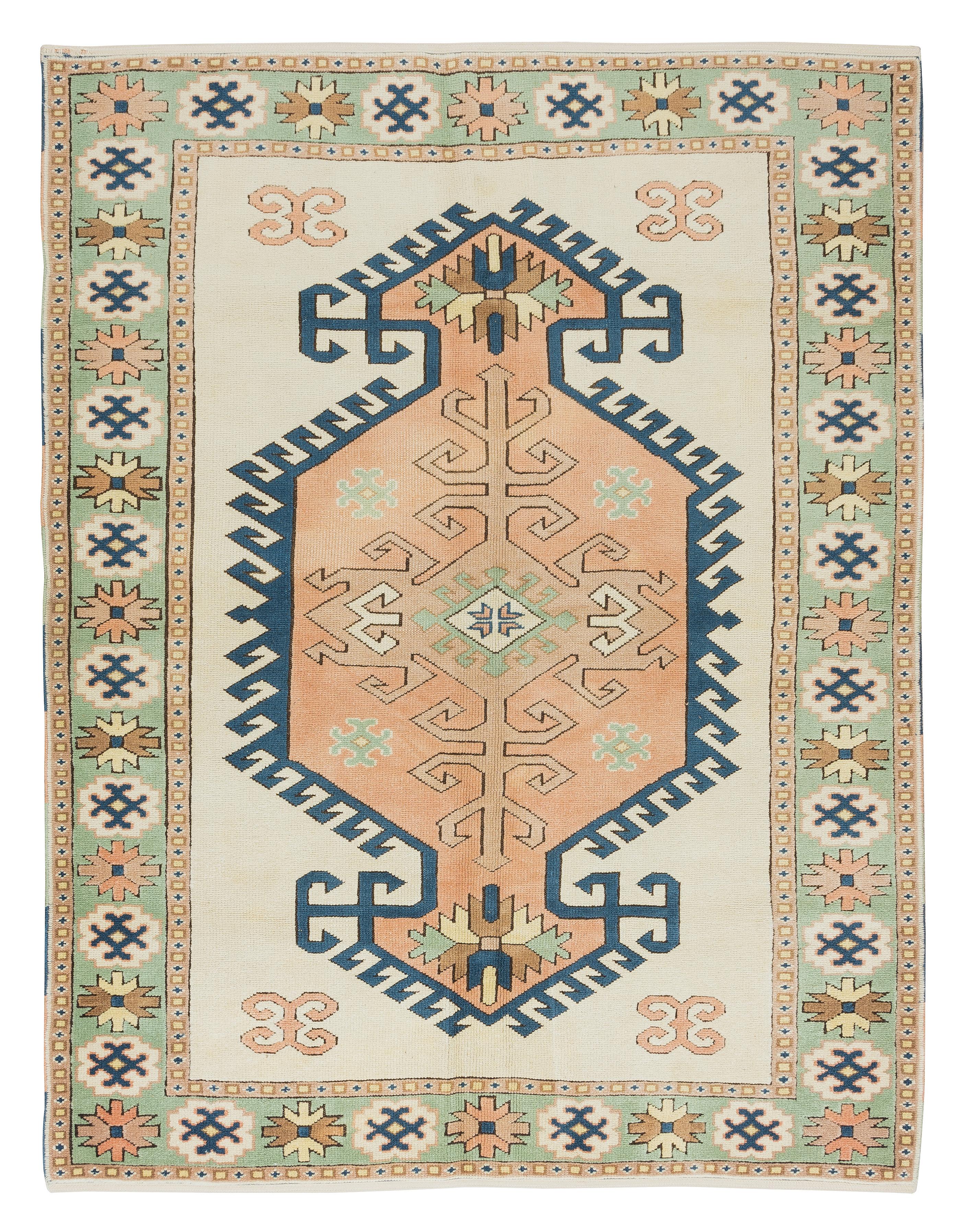 A hand-knotted contemporary Turkish rug.

This modern rug has even medium wool pile on wool foundation.

It is made of premium hand-spun sheep and natural dyes, ie. plant based non chemical dyes making it sought after, rare and special. 

The colors