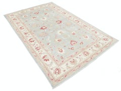 Alfombra de lana anudada a mano en azul claro y beige con diseño floral, de 1,5 x 1,8 m