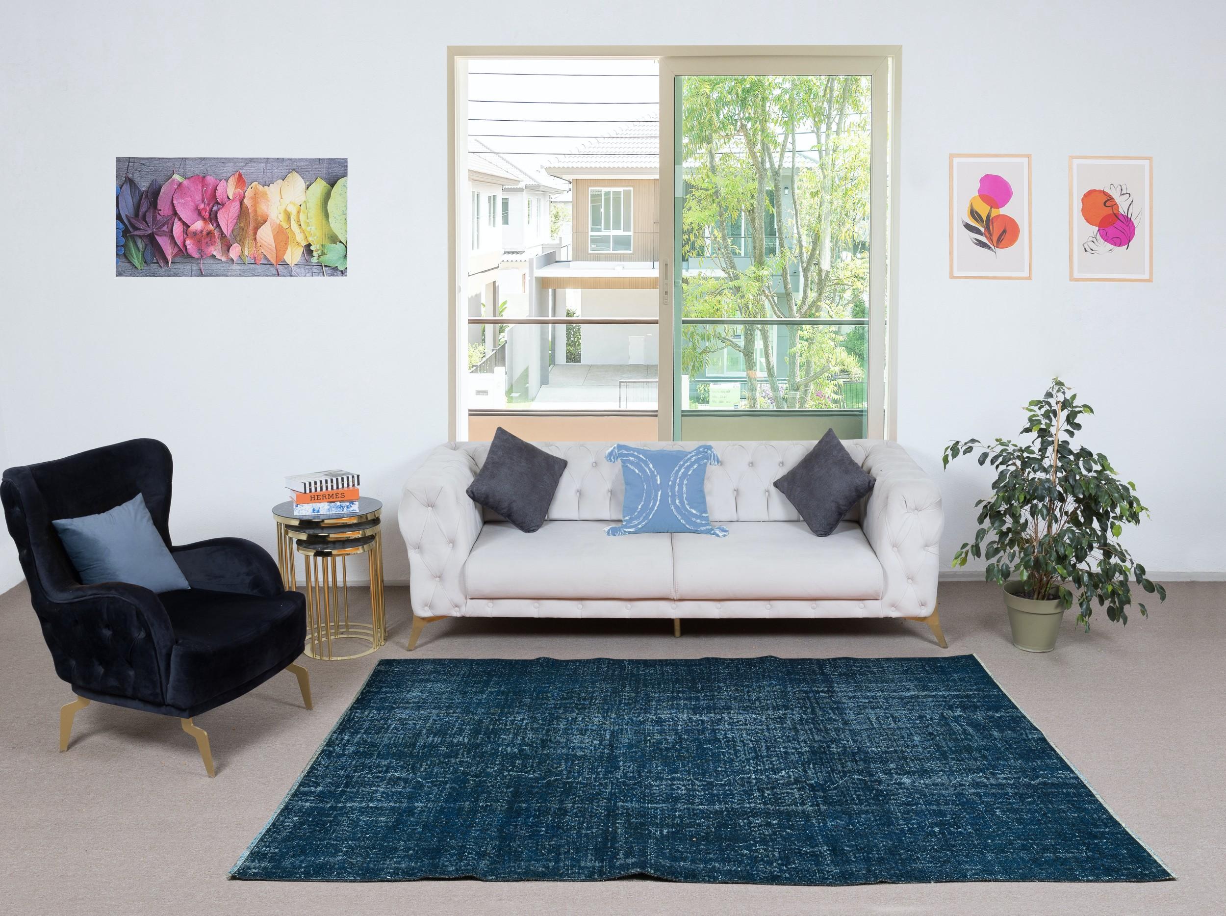 Our over-dyed rugs are all hand-knotted vintage pieces that are recreated in our workshop to cater to a wider range of interior design choices from modern to coastal, from industrial to rustic/cottage. These 50 to 70 year-old rugs were hand-knotted