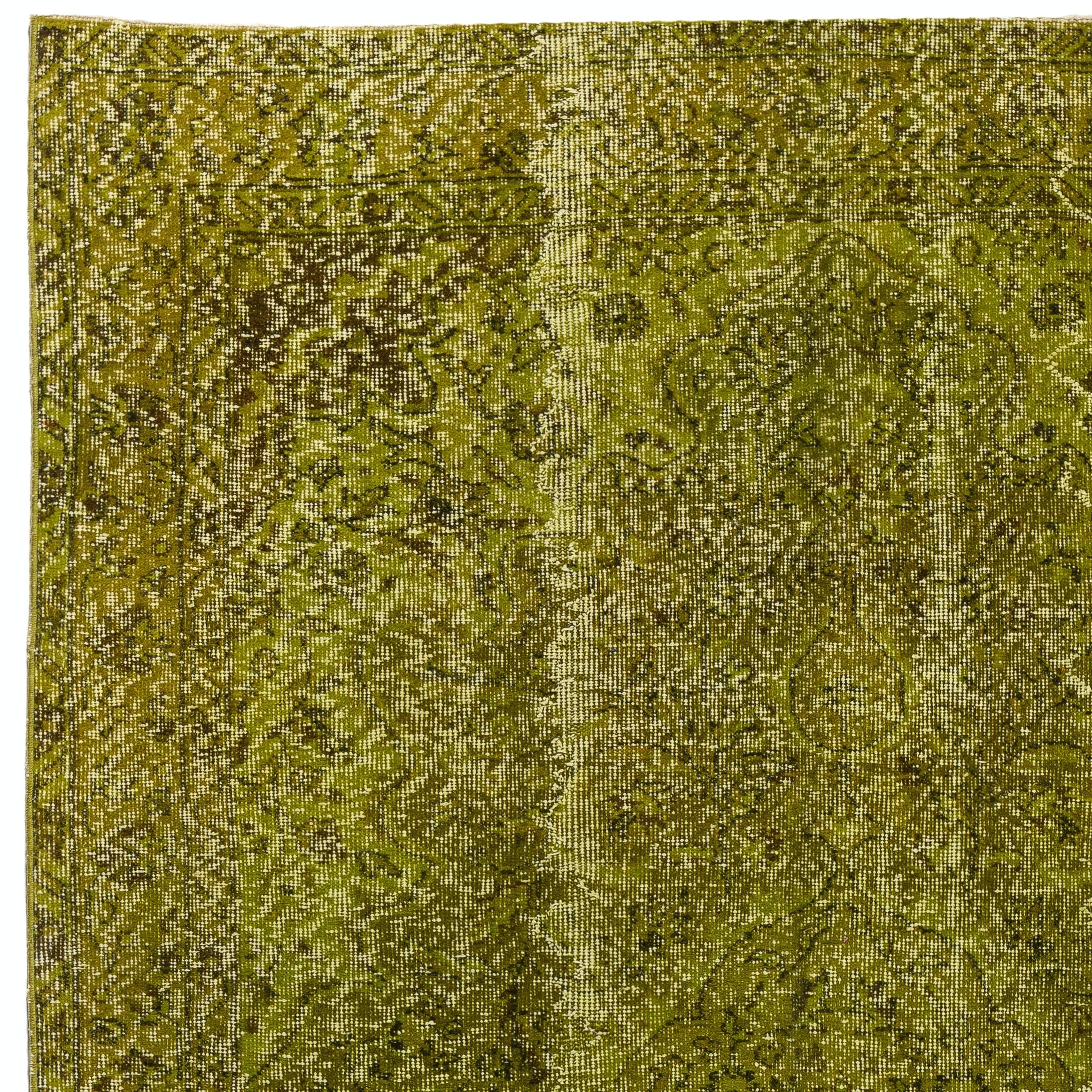 A vintage Turkish area rug re-dyed in light green color for contemporary interiors.
Finely hand knotted, low wool pile on cotton foundation. Professionally washed.
Sturdy and can be used on a high traffic area, suitable for both residential and