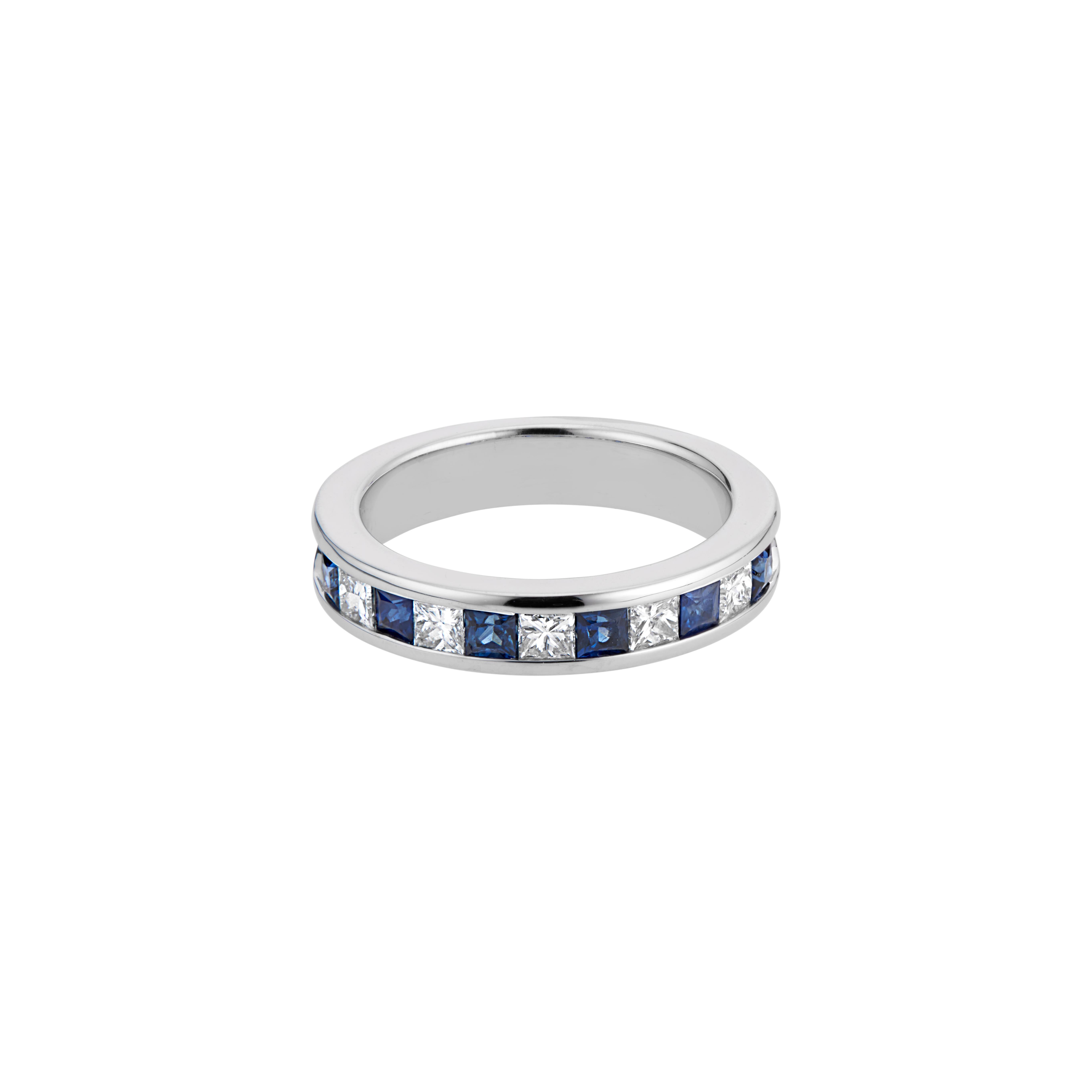 Sapphire and diamond wedding band ring. 6 square cut blue sapphires alternating with 5 princess cut diamonds, set in a 14k white gold channel set wedding band ring. 

6 square cut blue sapphires, approx. .54cts
5 princess cut diamonds, H-I VS-SI