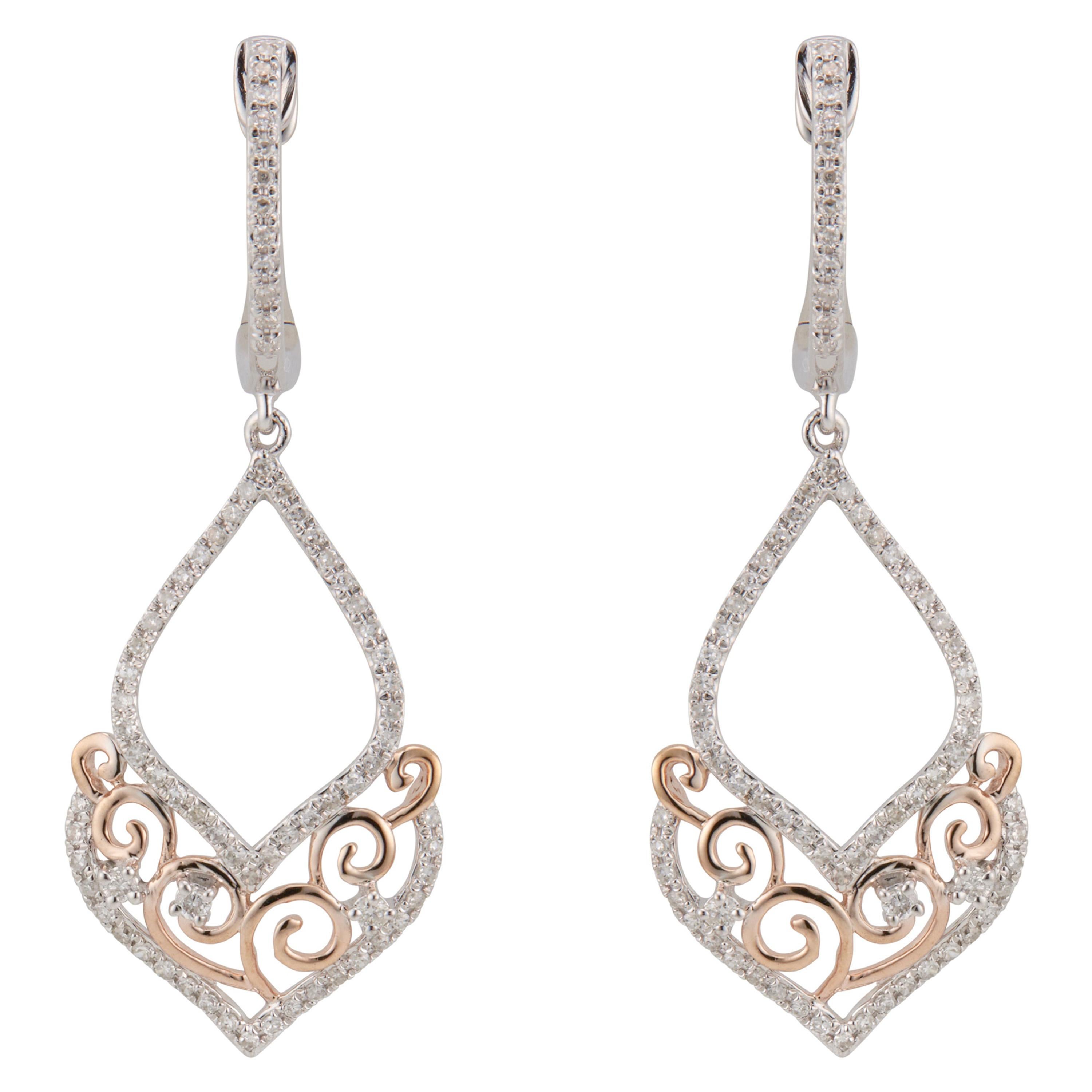 Pendants d'oreilles en or blanc et rose avec diamants de 0,54 carat