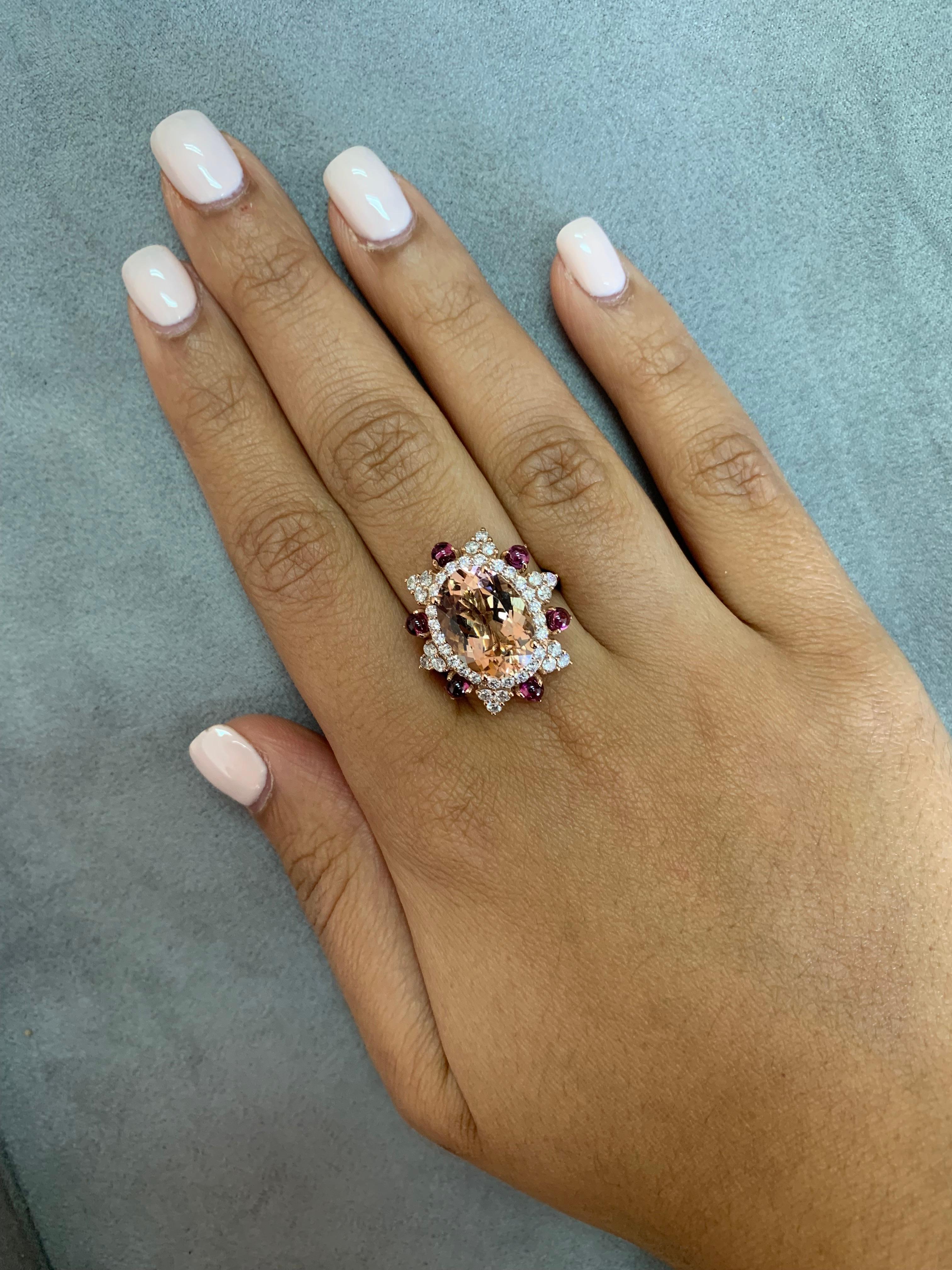 This collection features an array of magnificent morganites! Accented with diamonds these rings are made in rose gold and present a classic yet elegant look. The vibrant addition of red rhodolites perfectly assists the peachy hue of the morganite.