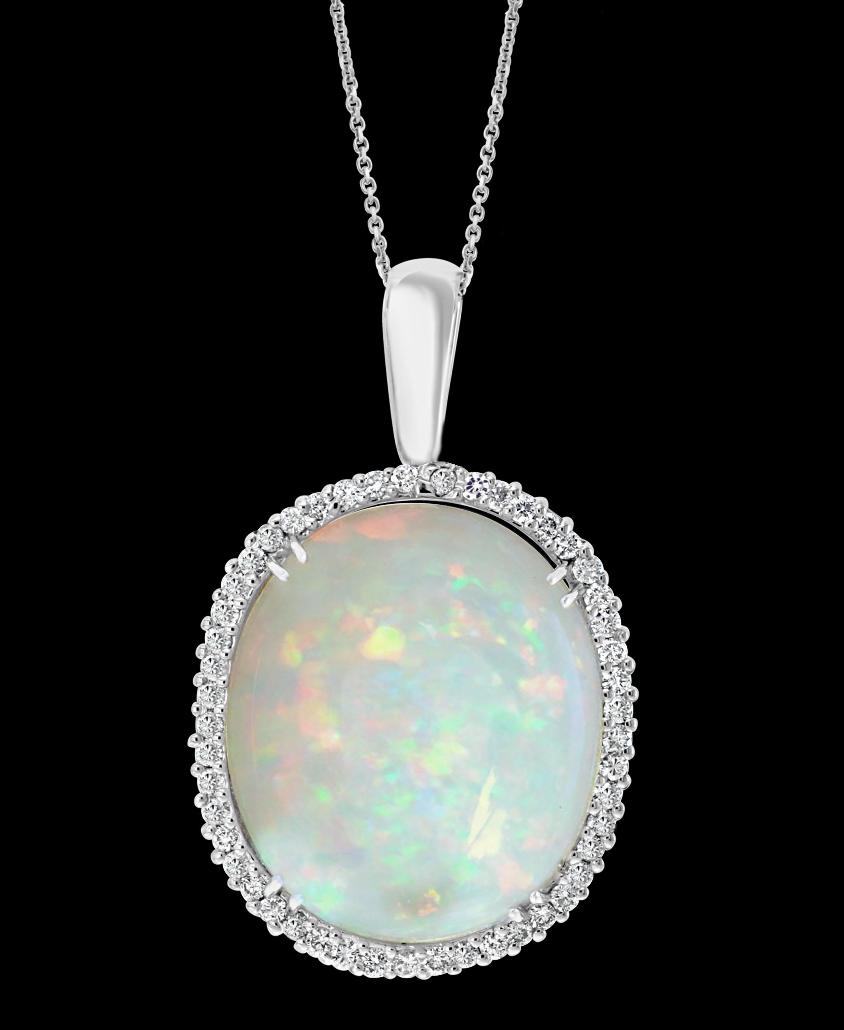 Oval Cut 54 Carat Oval Ethiopian Opal and Diamond Pendant / Necklace 14 Karat White Gold