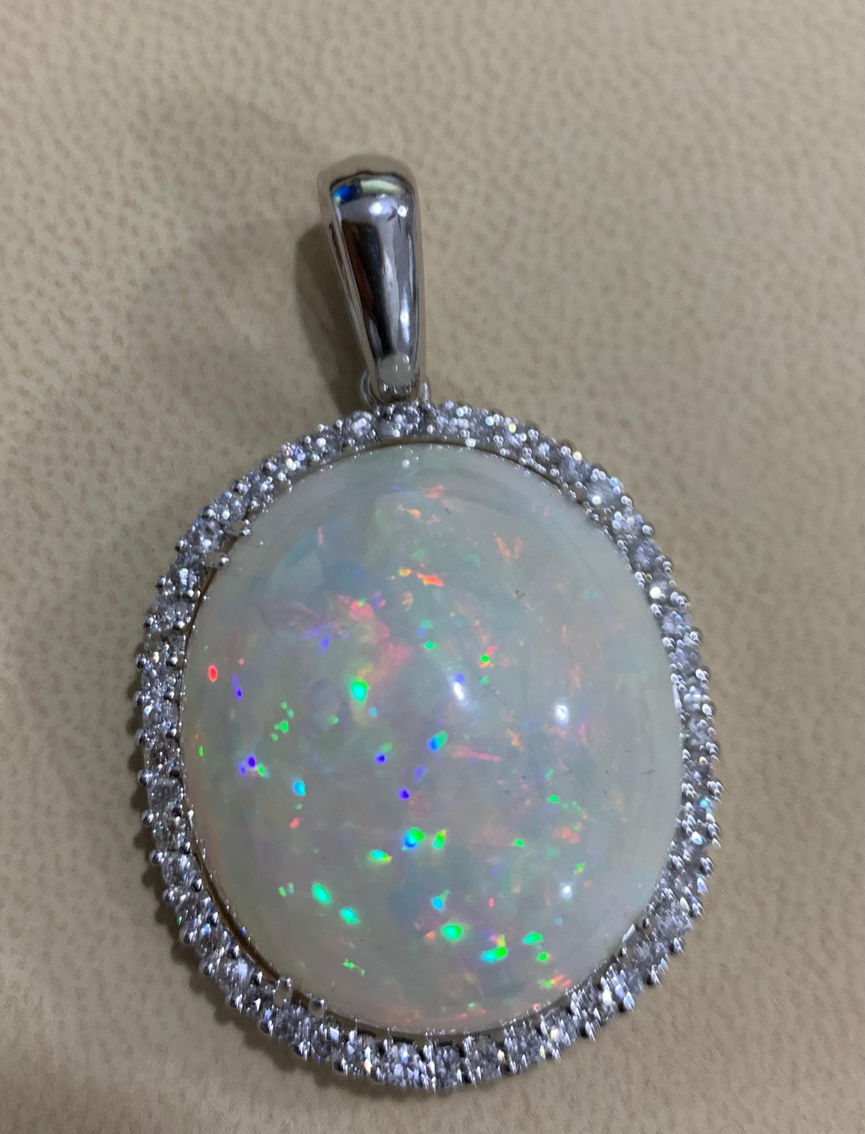 54 Carat Oval Ethiopian Opal and Diamond Pendant / Necklace 14 Karat White Gold In New Condition In New York, NY