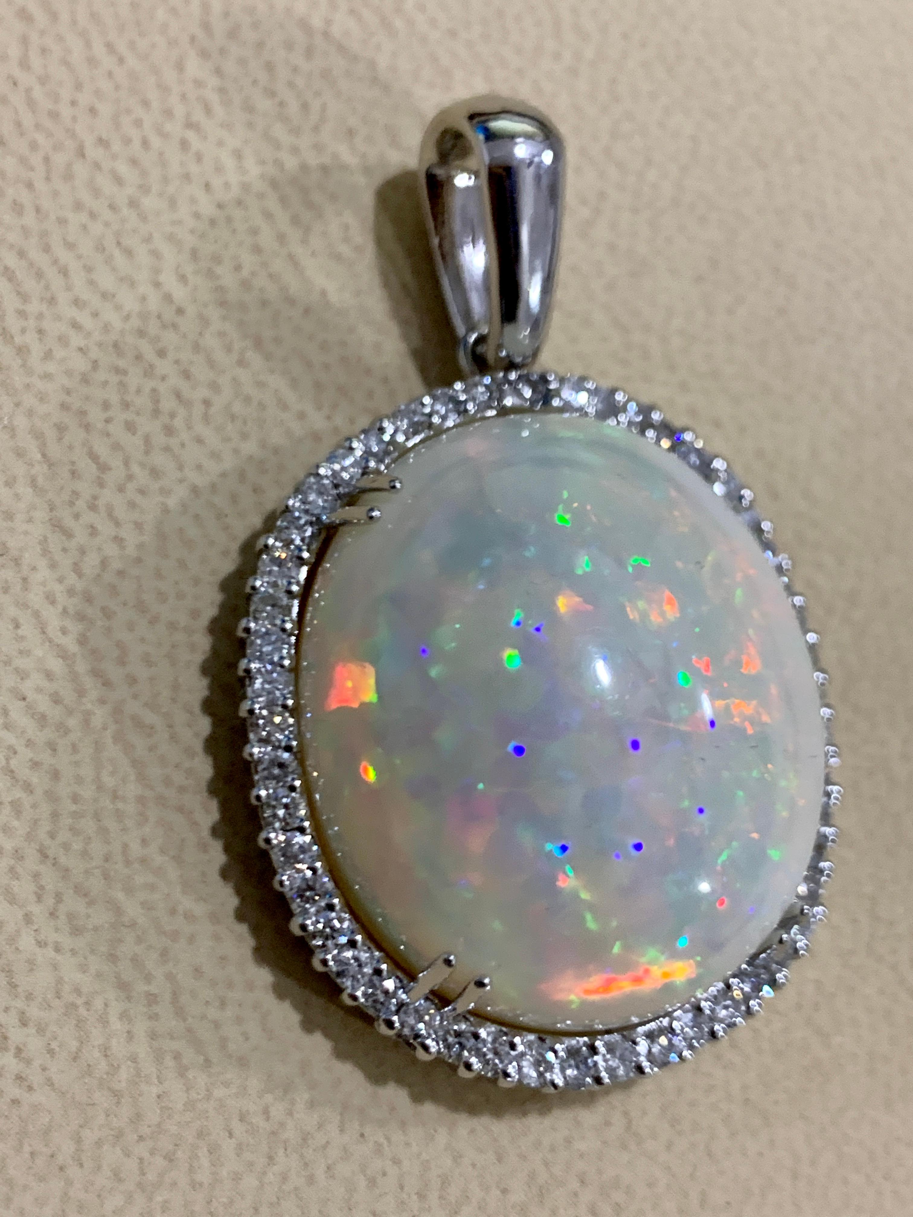 54 Carat Oval Ethiopian Opal and Diamond Pendant / Necklace 14 Karat White Gold 1