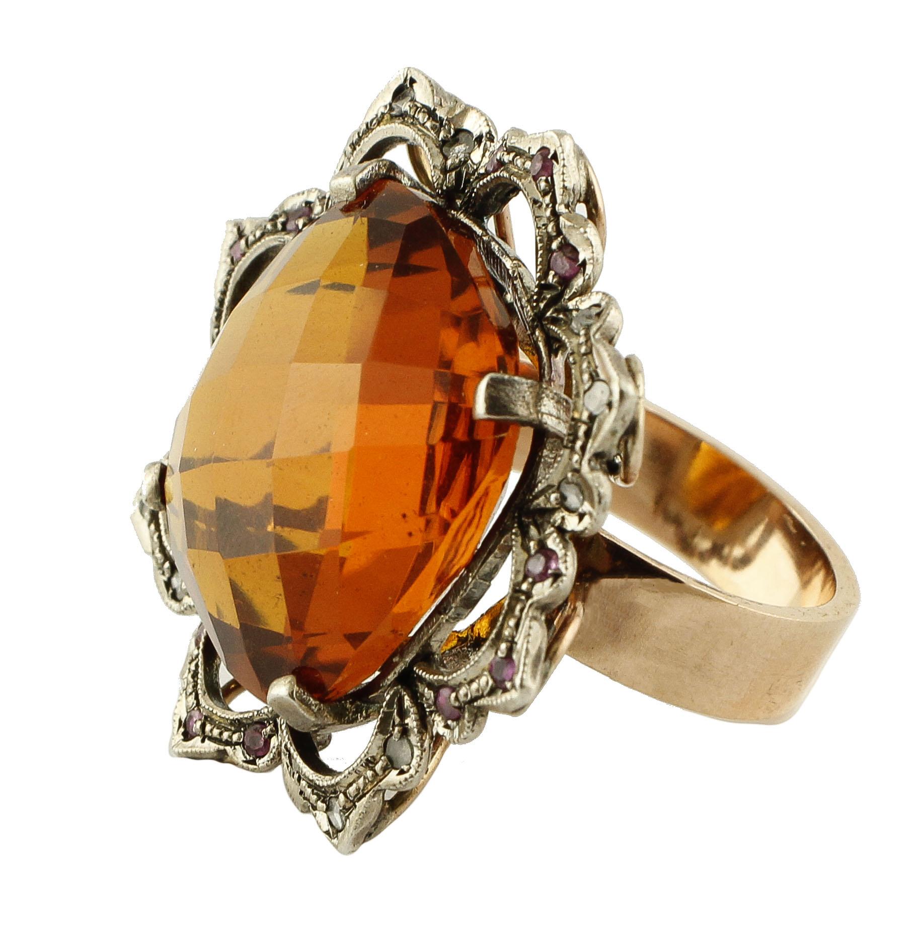 Amazing Cocktail ring in 9K rose gold and silver structure mounted with gorgeous intense color 5.4 g of citrine (20 mm X 20 mm), surrounded by rose gold and silver petals detailes studded by little diamonds and rubies.
Diamonds 0.11 ct
Rubies 0.31