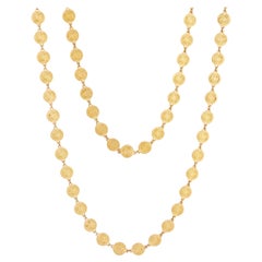 54" Gold Swirl Disc Chain Necklace By Crown Trifari, 1960s