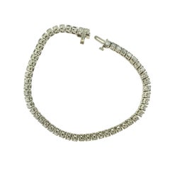 Bracelet tennis en or blanc avec 54 diamants ronds de 8,1 carats