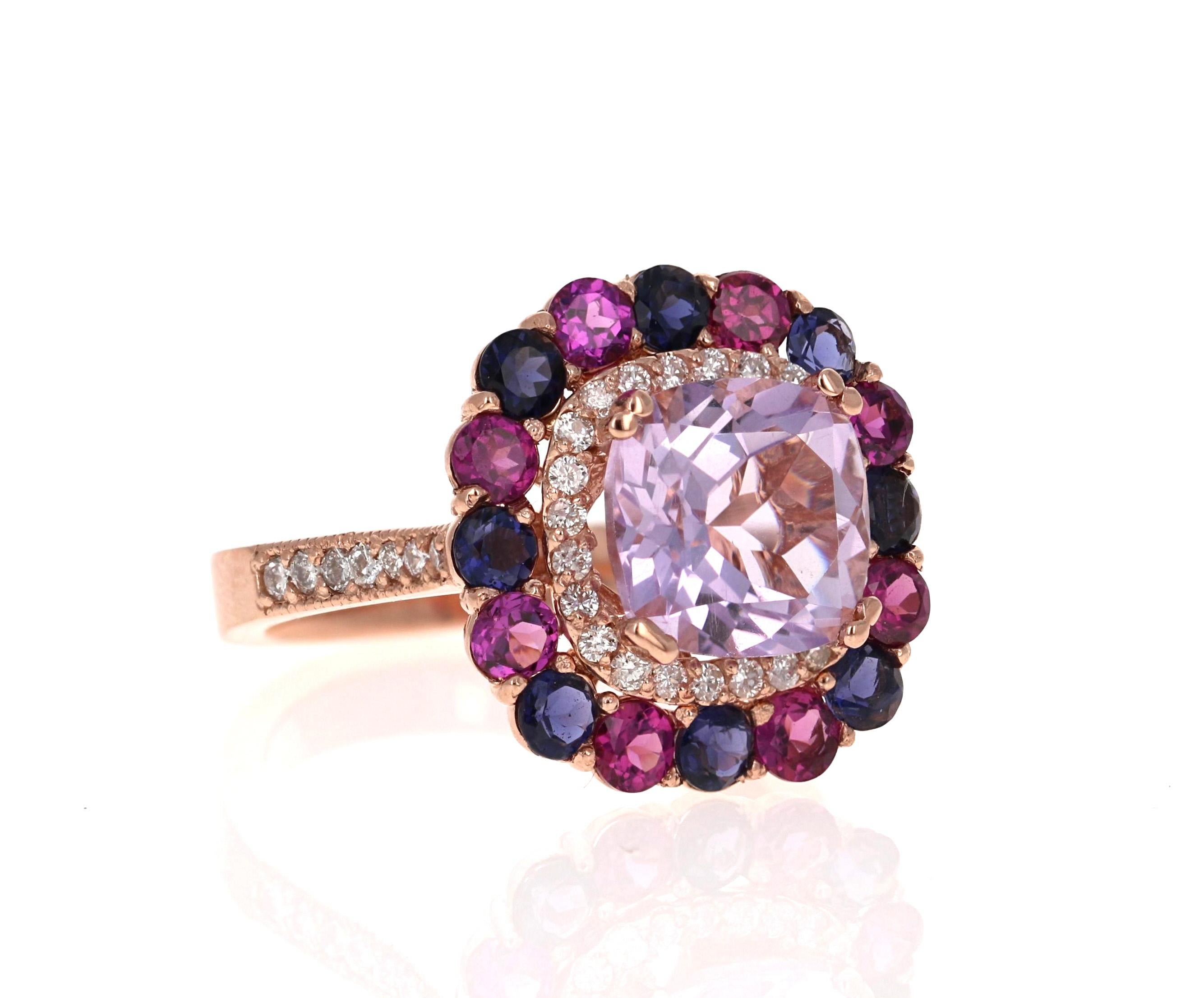 Amethyst, Purple Garnet and Diamond Cocktail Ring!   A beautiful and sparkly combination of Purple beauty!

This one of a kind piece has been carefully designed and curated by our in house designer!

This ring has a light purple Cushion Cut Amethyst