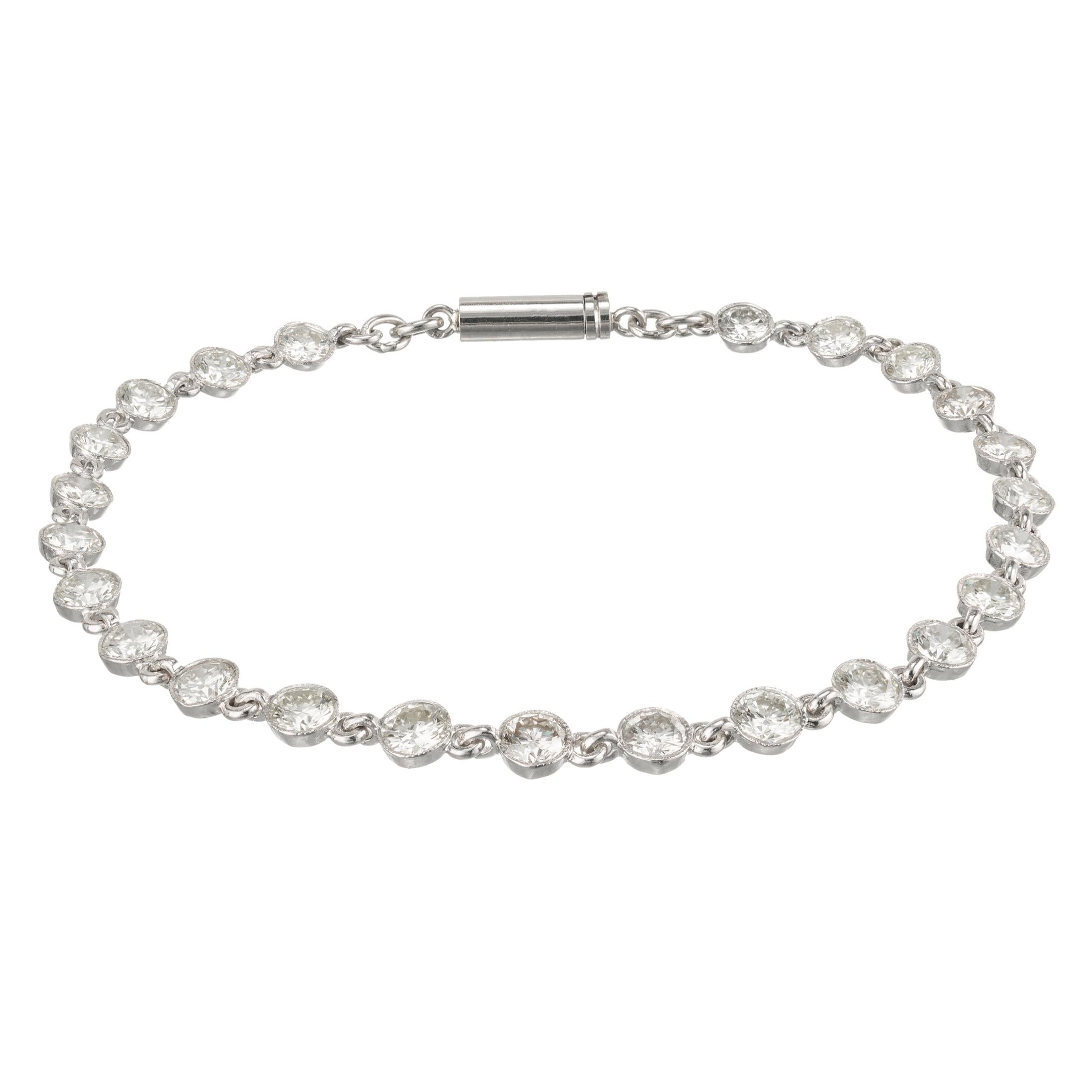 24 round diamond handmade solid Platinum tube set bracelet with Platinum connecting rings. 

24 full cut diamonds, approx. total weight 5.40cts, H to I, VS1 - SI1
Length: 8 inches
Platinum
Stamped: Plat
9.2 grams
Width: 4.5mm
Depth: 2.5mm