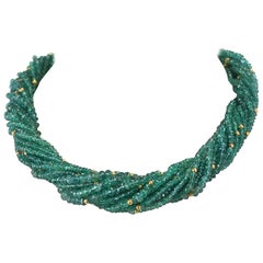 Collar gargantilla de 540 quilates de esmeralda auténtica y natural facetada con cuentas de oro