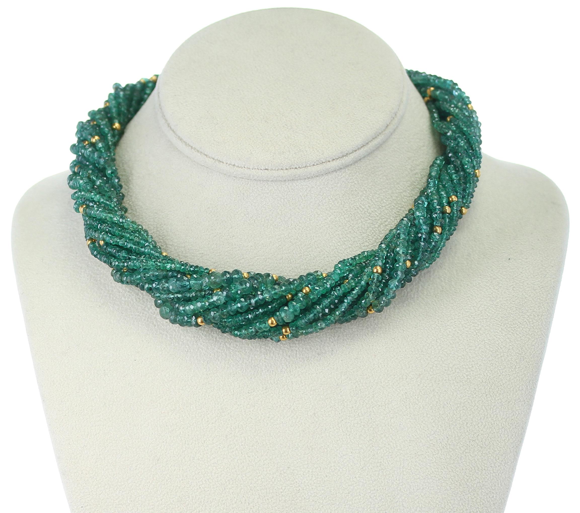 A Genuine & Natural Emerald Faceted with Gold Beads Choker Necklace consisting of 15 lines weighing 540 carats with an 18K Yellow Gold Clasp. The length is 17.50