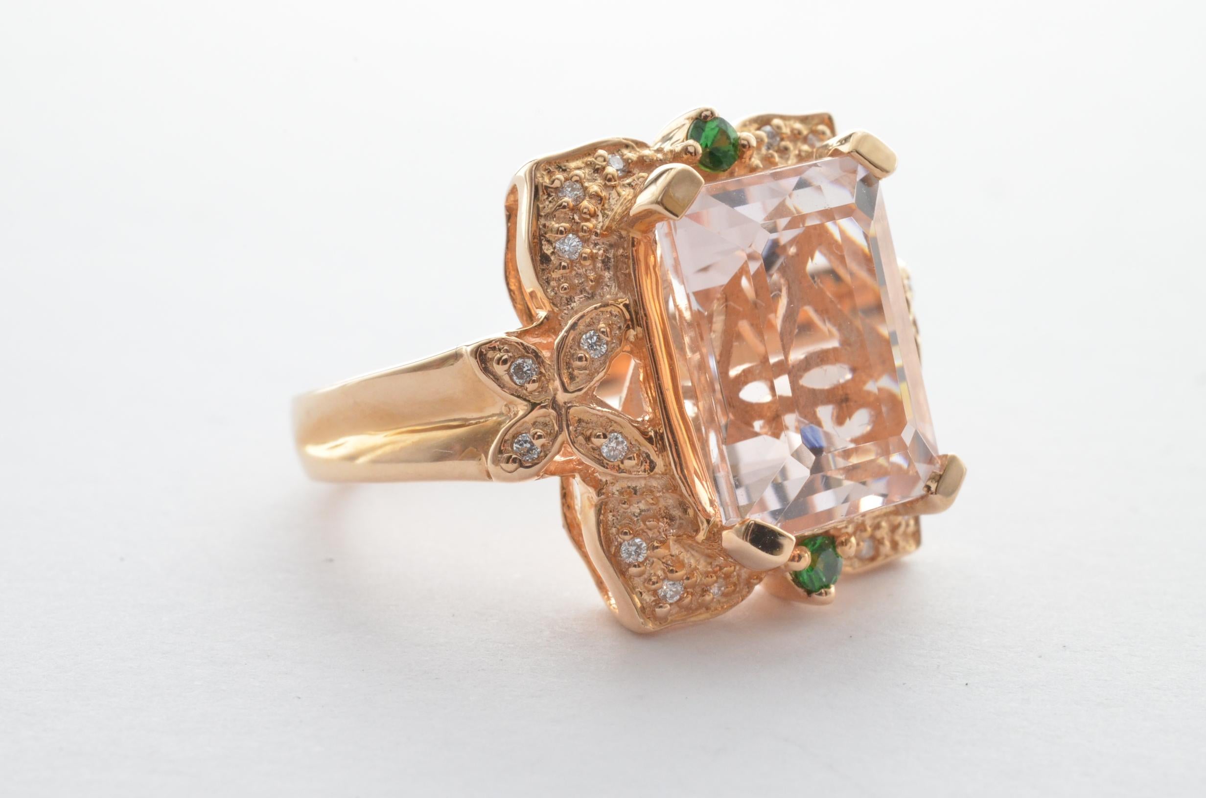 This collection features an array of magnificent morganites! Accented with Diamonds these rings are made in Rose gold and present a classic yet elegant look. 

Classic morganite ring in 14K Rose gold with Tsavorite and Black Diamonds. 

Morganite: