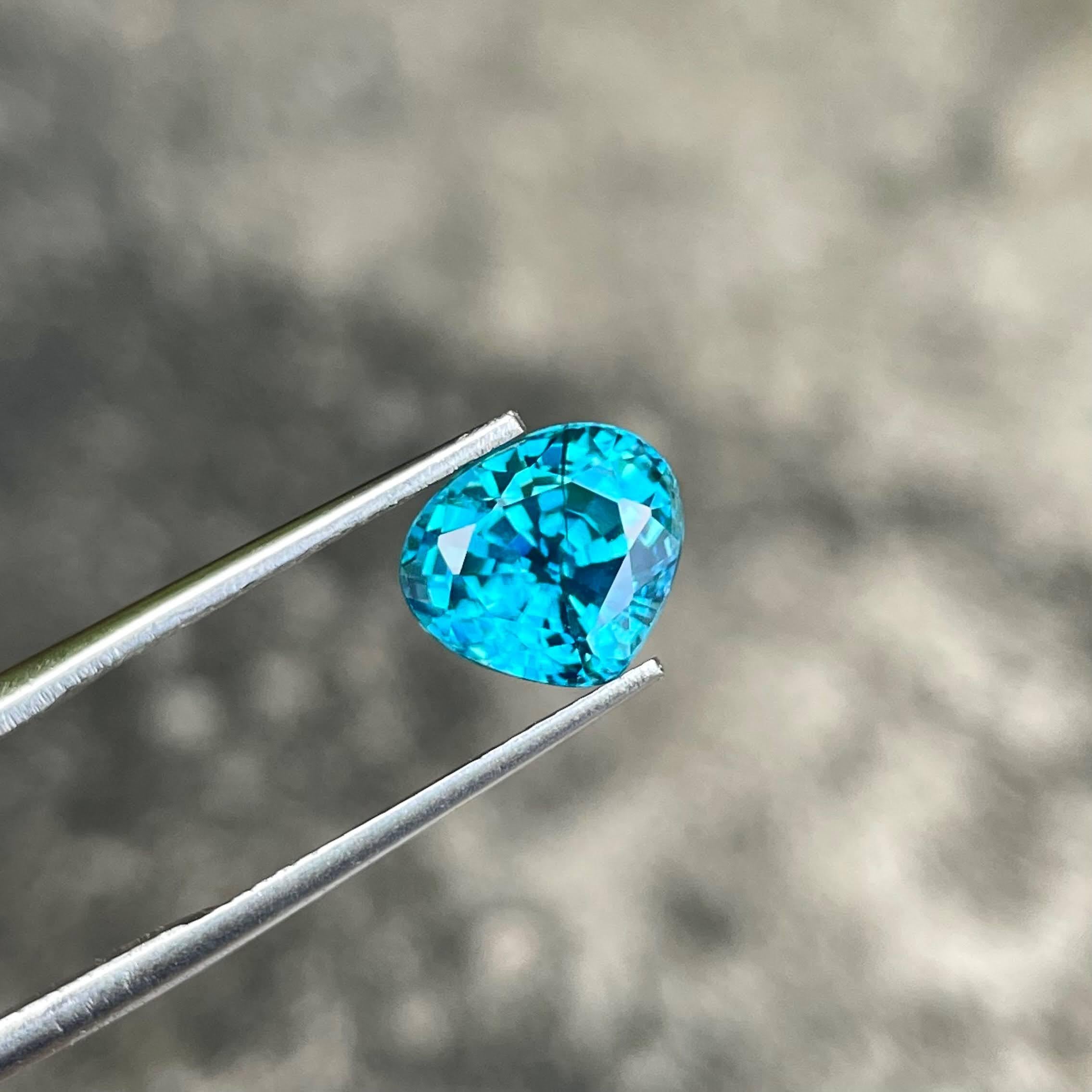 Weight 5.40 carats 
Dimensions 8.4x9.6x6.9 mm
Treatment Heated 
Origin Cambodia 
Clarity VVS
Shape triangular 
Cut Faceted 



The 5.40 carat Blue Zircon stone is a remarkable gemstone, known for its captivating beauty and vibrant color. Originating