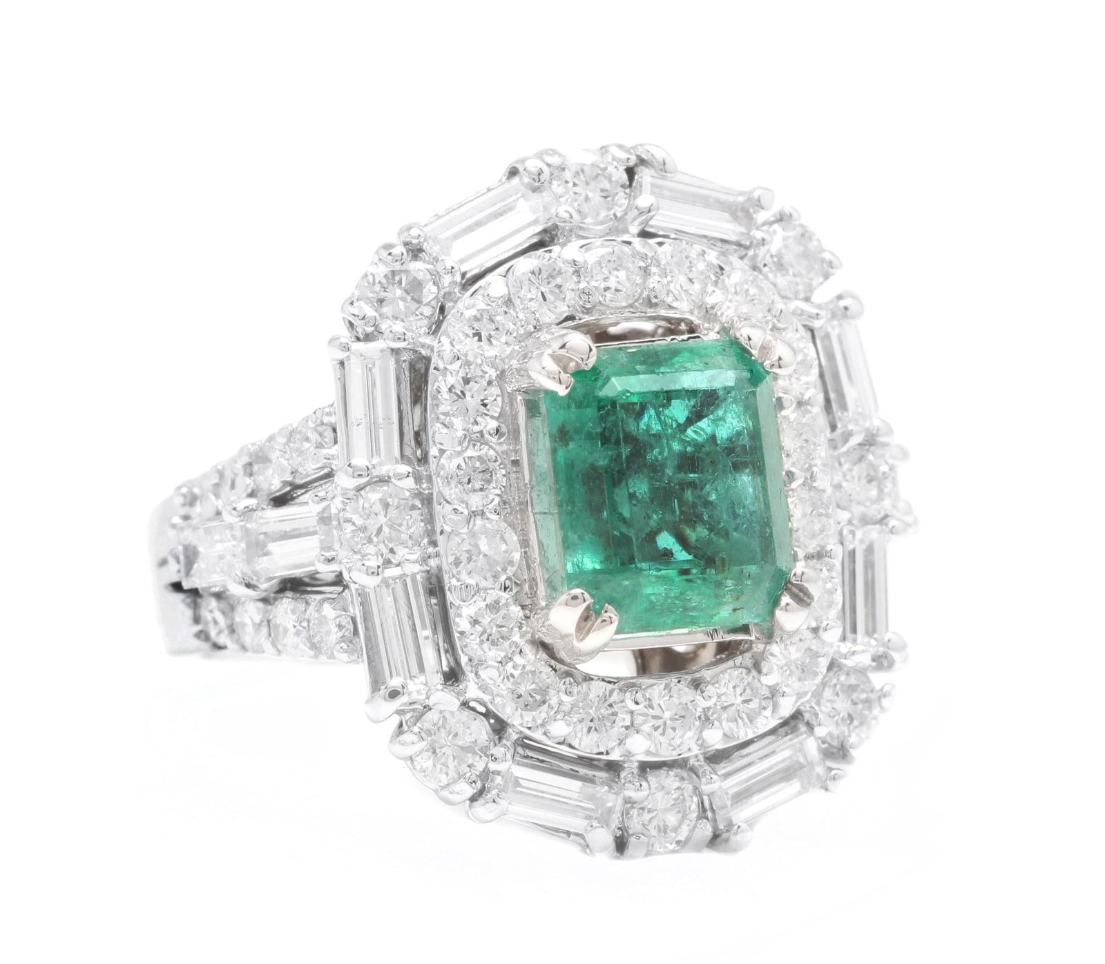 5.40 Carats Natural Emerald and Diamond 14K Solid White Gold Ring

Suggested Replacement Value: Approx. $9,000.00

Total Natural Green Emerald Weight is: Approx. 2.80 Carats (transparent)

Emerald Measures: Approx. 9 x 8mm

Emerald Treatment: