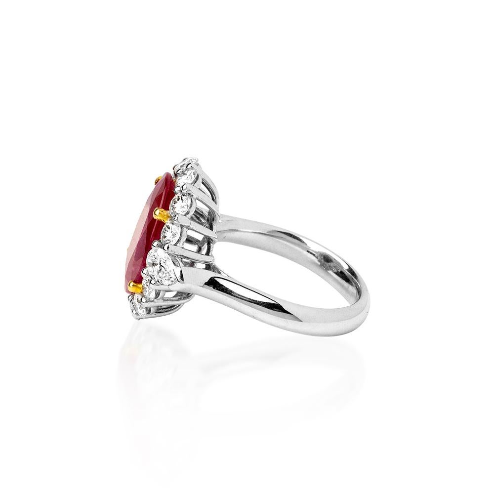 Modern 5.40 Carats Natural Ruby Solitaire Ring Surrounded with 1.55 Ct's Diamonds For Sale