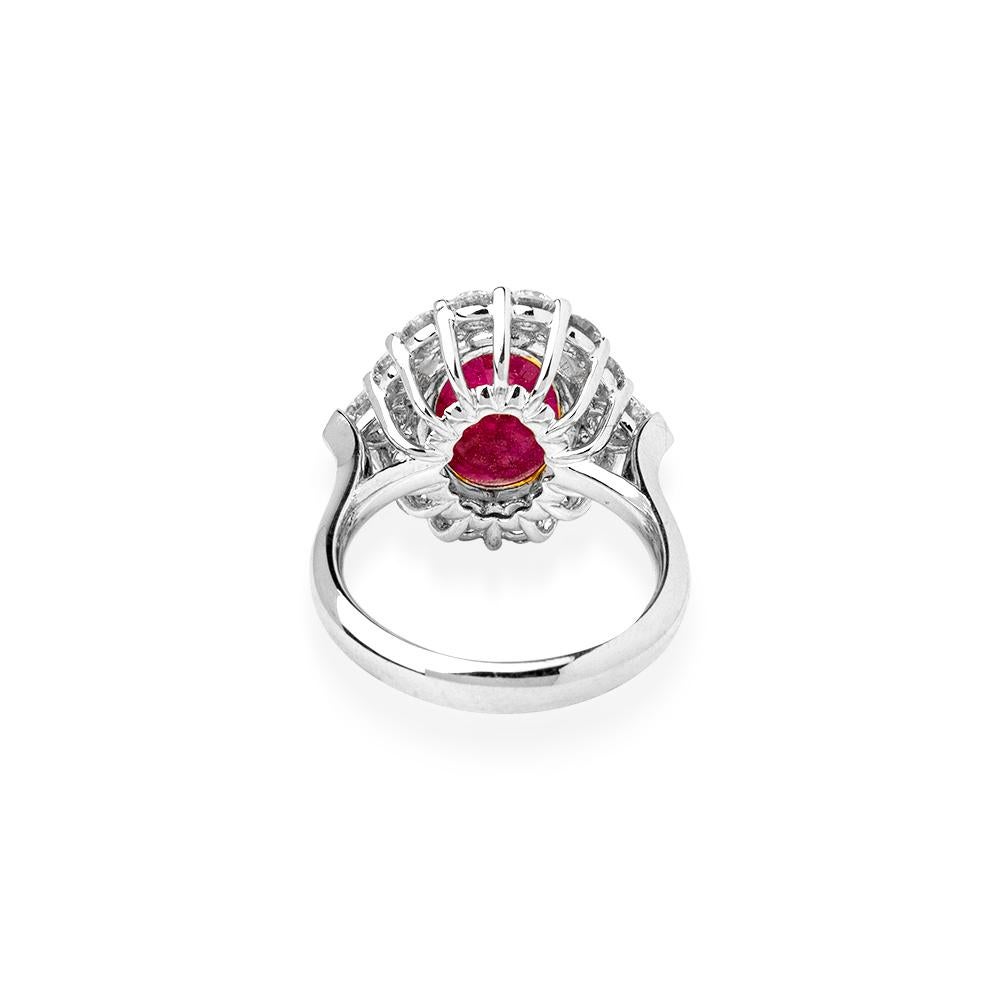 Oval Cut 5.40 Carats Natural Ruby Solitaire Ring Surrounded with 1.55 Ct's Diamonds For Sale