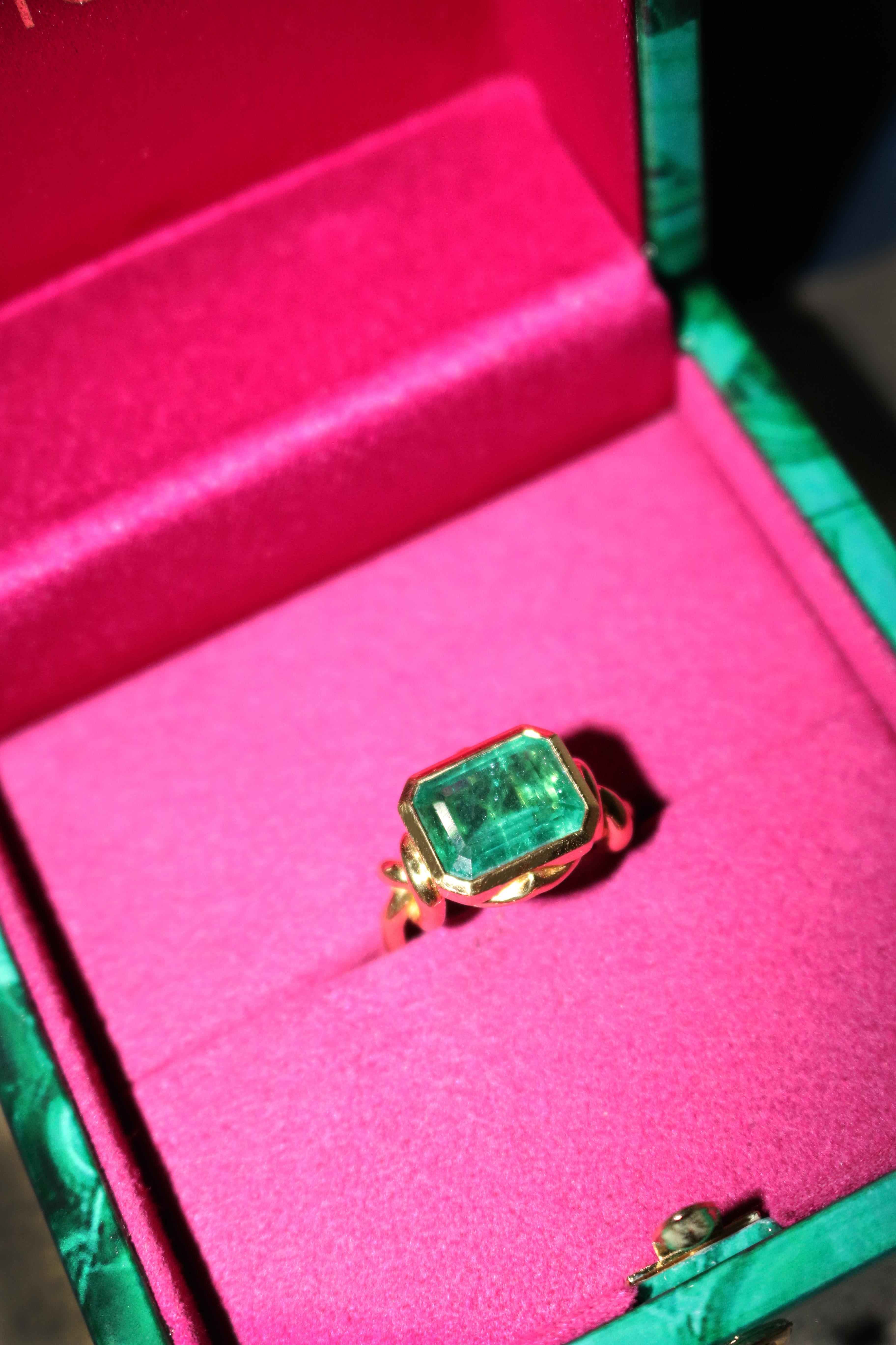Glamorously bold and unabashedly seductive. This showstopper ring features a glorious bezel set emerald, embraced by powerful-golden ropes, converging to two knots on either side of the luscious, one-of-a-kind stone. 

Custom Made Jewel

Bezel set