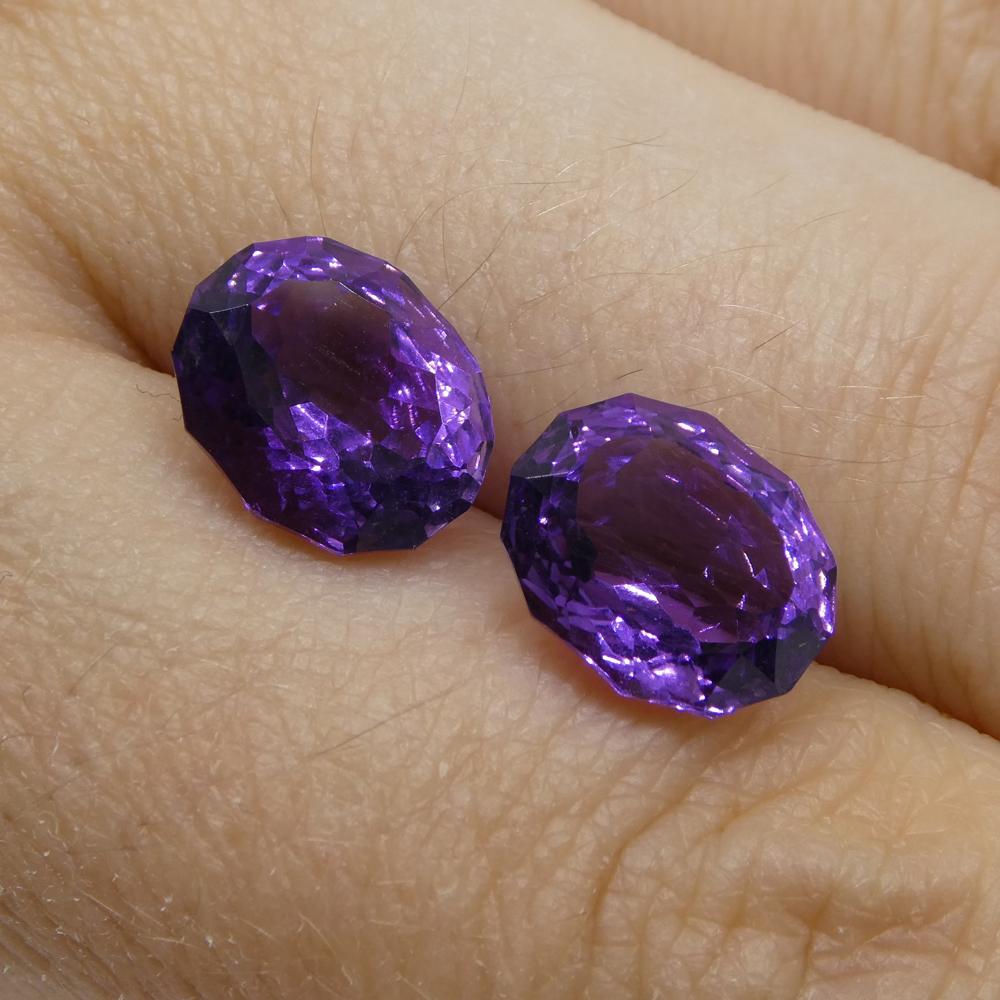 Description:

Gem Type: Amethyst
Number of Stones: 2
Weight: 5.4 cts
Measurements: 10.00 x 8.00 x 5.90 mm
Shape: Oval
Cutting Style Crown: Modified Brilliant
Cutting Style Pavilion: Mixed Cut
Transparency: Transparent
Clarity: Very Slightly
