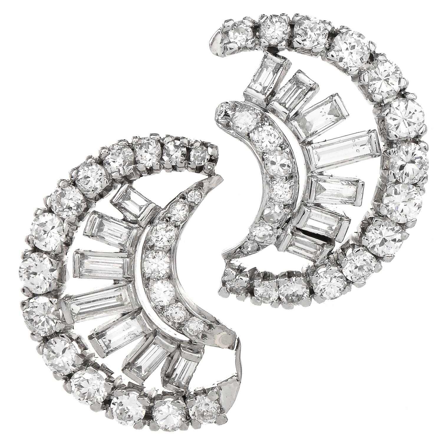 These vintage Crescent Diamond earrings are crafted in platinum, weighing approx. 17.7 grams and measuring 27mm x 18mm wide.  The earrings are covered with graduated round baguette-cut prong-set natural diamonds  These variously cut
