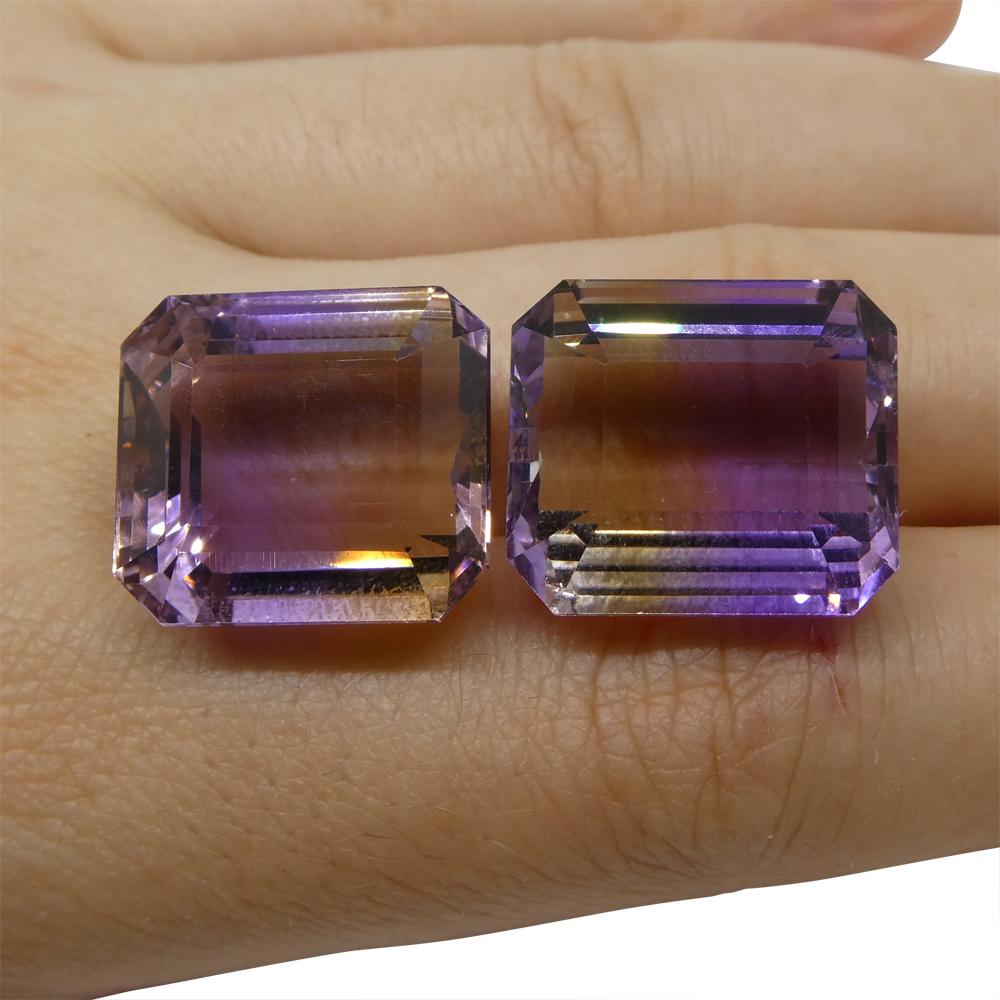 Description:

One Pair Loose Ametrine

Weight: 54.18 cts
Measurements: 18.15x15.80x11.16 mm and 17.68x16.00x11.37 mm
Shape: Emerald Cut
Cutting Style: Emerald Step Cut
Cutting Style Crown: Step Cut
Cutting Style Pavilion: Step Cut
Transparency: