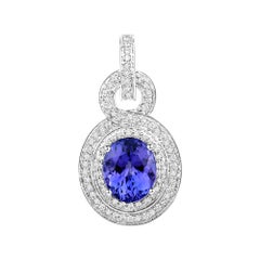 5.42 Carat Genuine Tanzanite and White Diamond 14 Karat White Gold Pendant