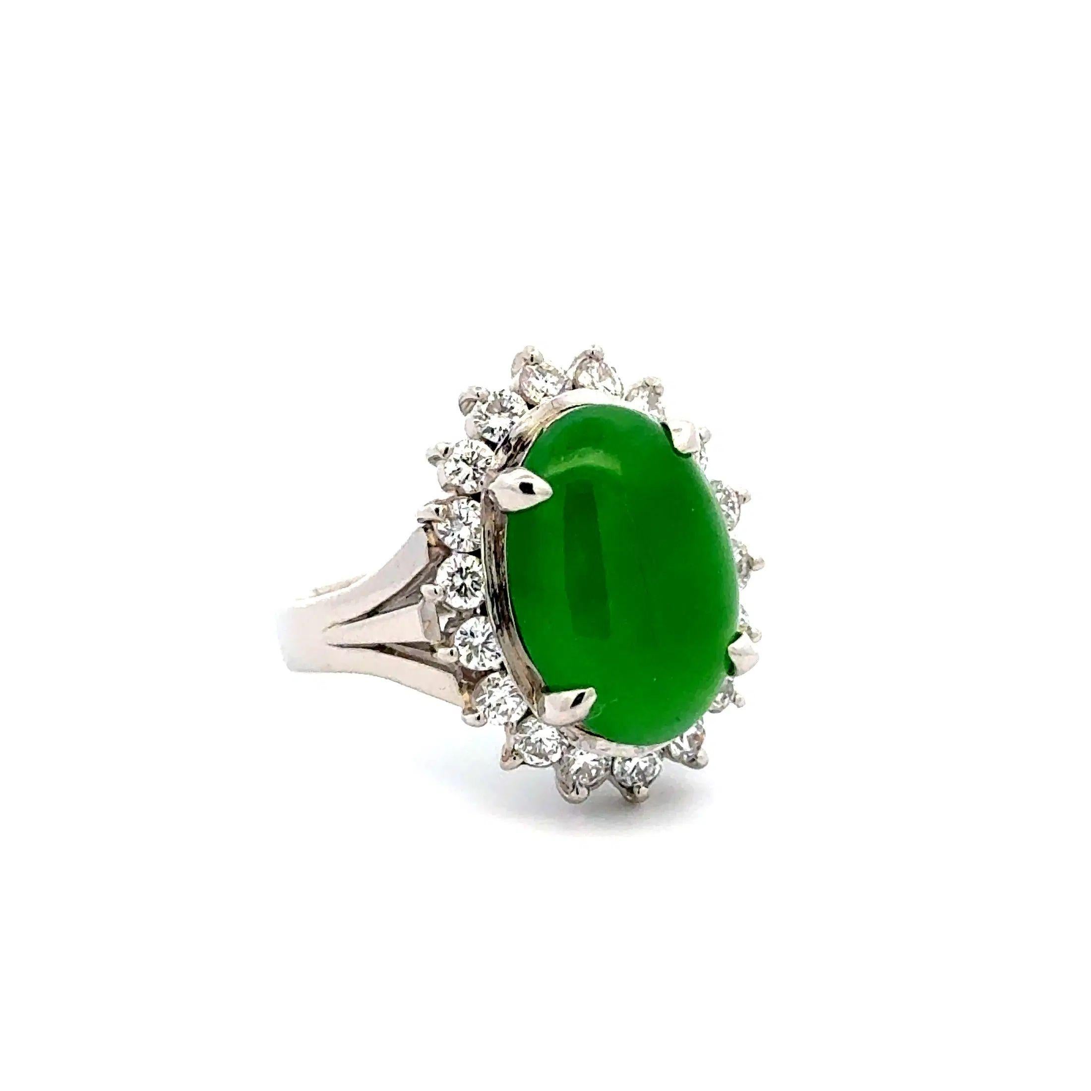Simply Beautiful! Finely detailed Oval A Jade GIA and Diamond Platinum Ring. Centering a securely nestled Oval Jade, weighing approx. 5.42 Carats, GIA #5221826617. Surrounded by Round Brilliant Cut Diamonds, weighing approx. 0.87tcw. Hand crafted