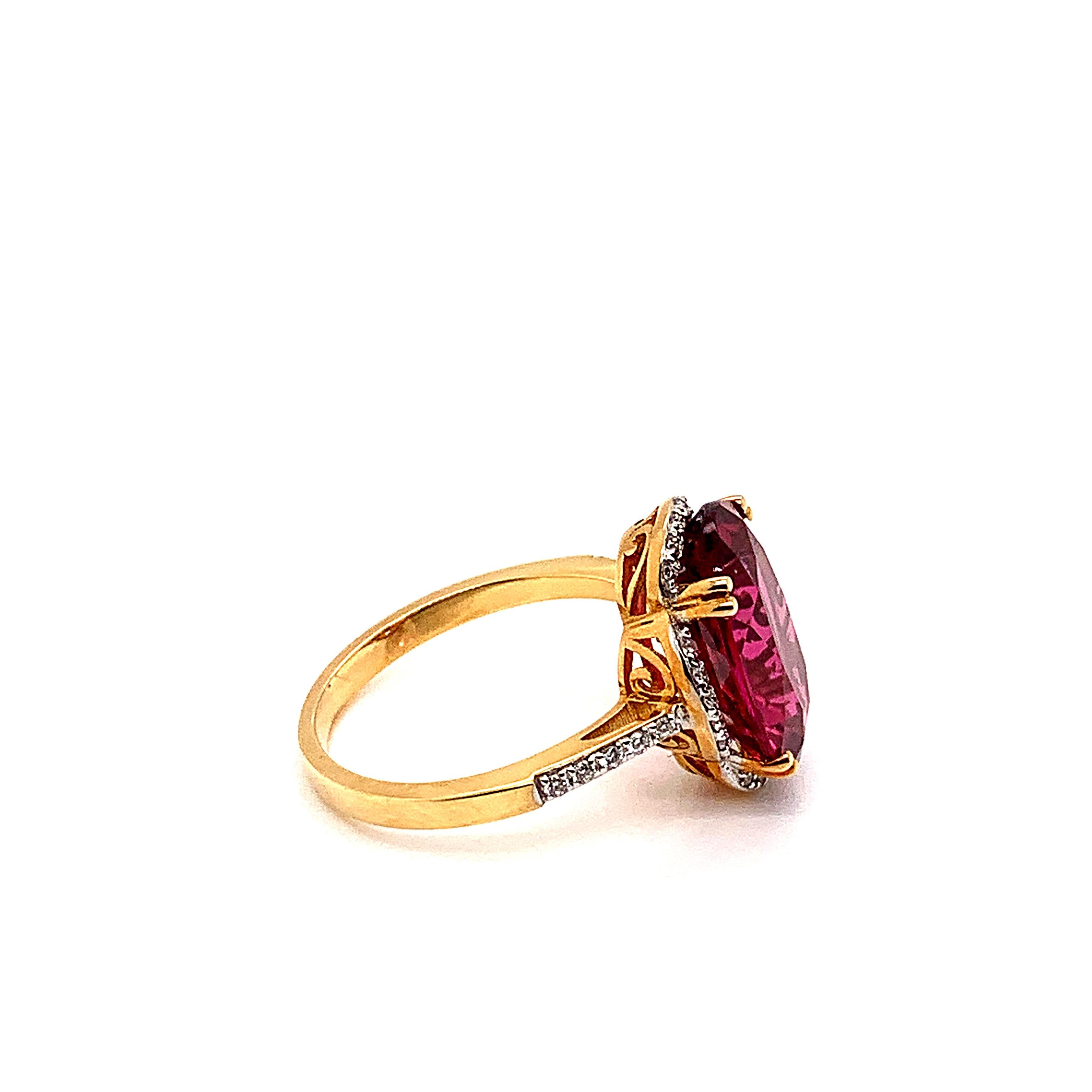 Oval Cut 5.42 Carat Oval Shaped Rubelite Ring in 18 Karat Yellow Gold with Diamonds For Sale