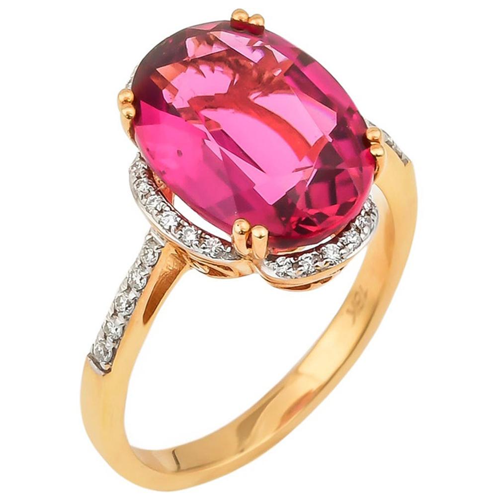 5.42 Carat Oval Shaped Rubelite Ring in 18 Karat Yellow Gold with Diamonds For Sale