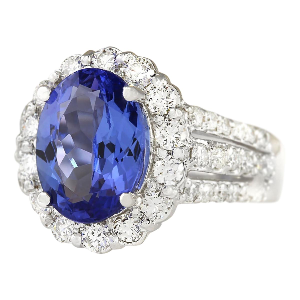 Introducing our stunning 5.42 Carat Tanzanite 14 Karat White Gold Diamond Ring. Crafted from stamped 14K White Gold, this ring weighs 8.6 grams, ensuring both quality and durability. The focal point is a captivating Tanzanite gemstone weighing 3.77