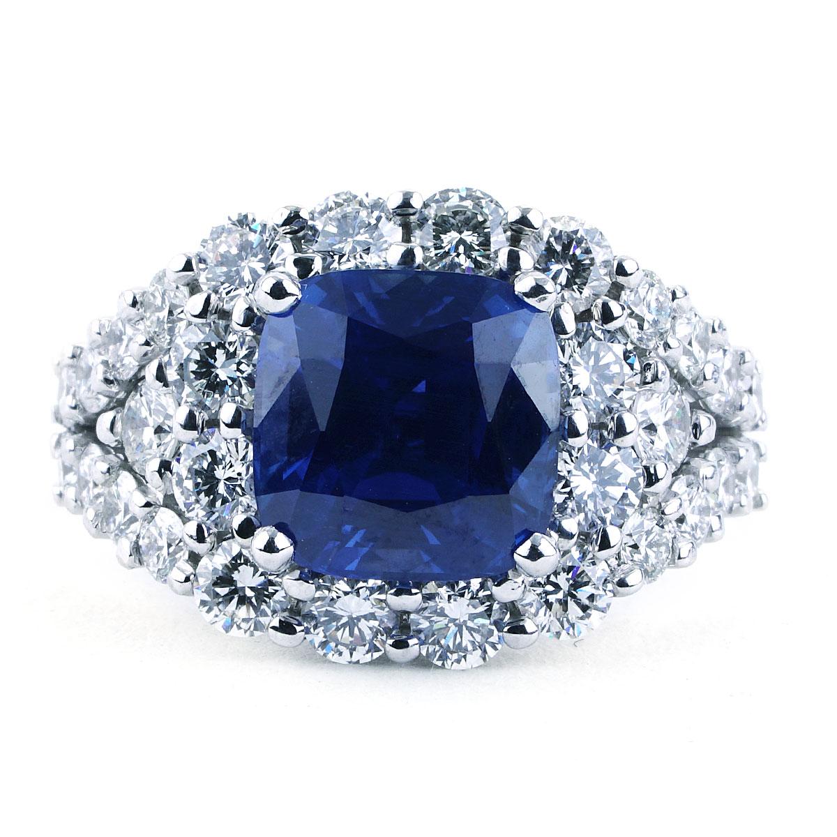 Contemporary 5.42 CT GIA Certified Unheated Blue Ceylon Sapphire and Diamond Ring 18K Gold For Sale