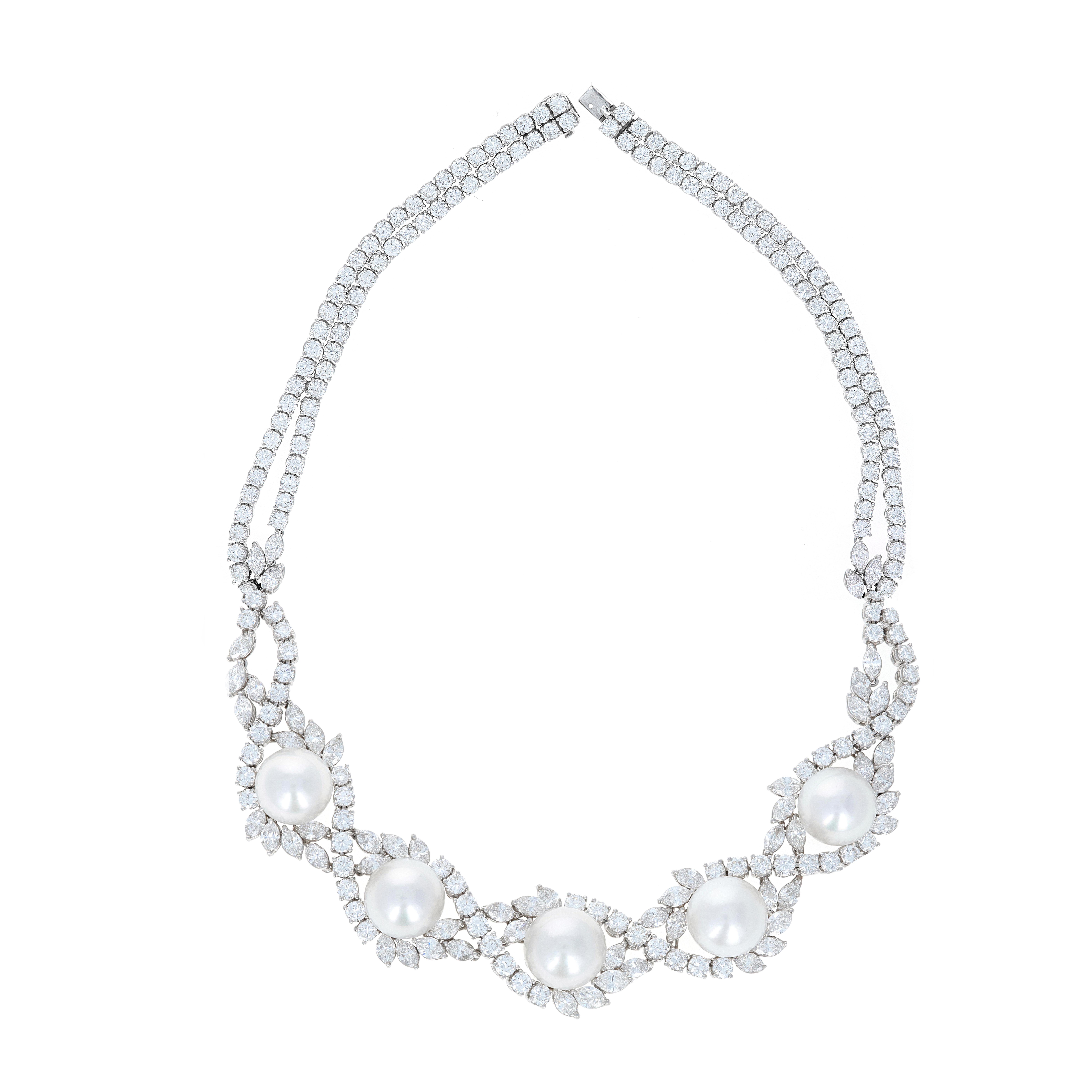Platinum diamond and pearl necklace, earring & ring set .
The necklace has 232 white diamonds that are round and marquise. The total diamond weight of the necklace is 43.00 carats. The 5 pearls on the necklace measure 14.0mm; 14.5mm; 15.00mm; 14.6mm