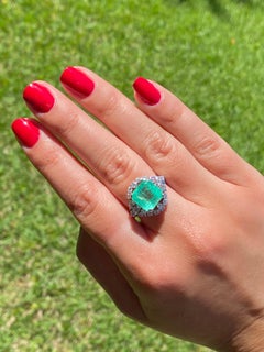 5.43 Carat Colombian Emerald and Baguette Diamonds Mounted in Platinum Ring