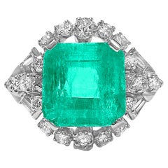 5.43 Carat Colombian Emerald and Baguette Diamonds Mounted in Platinum Ring