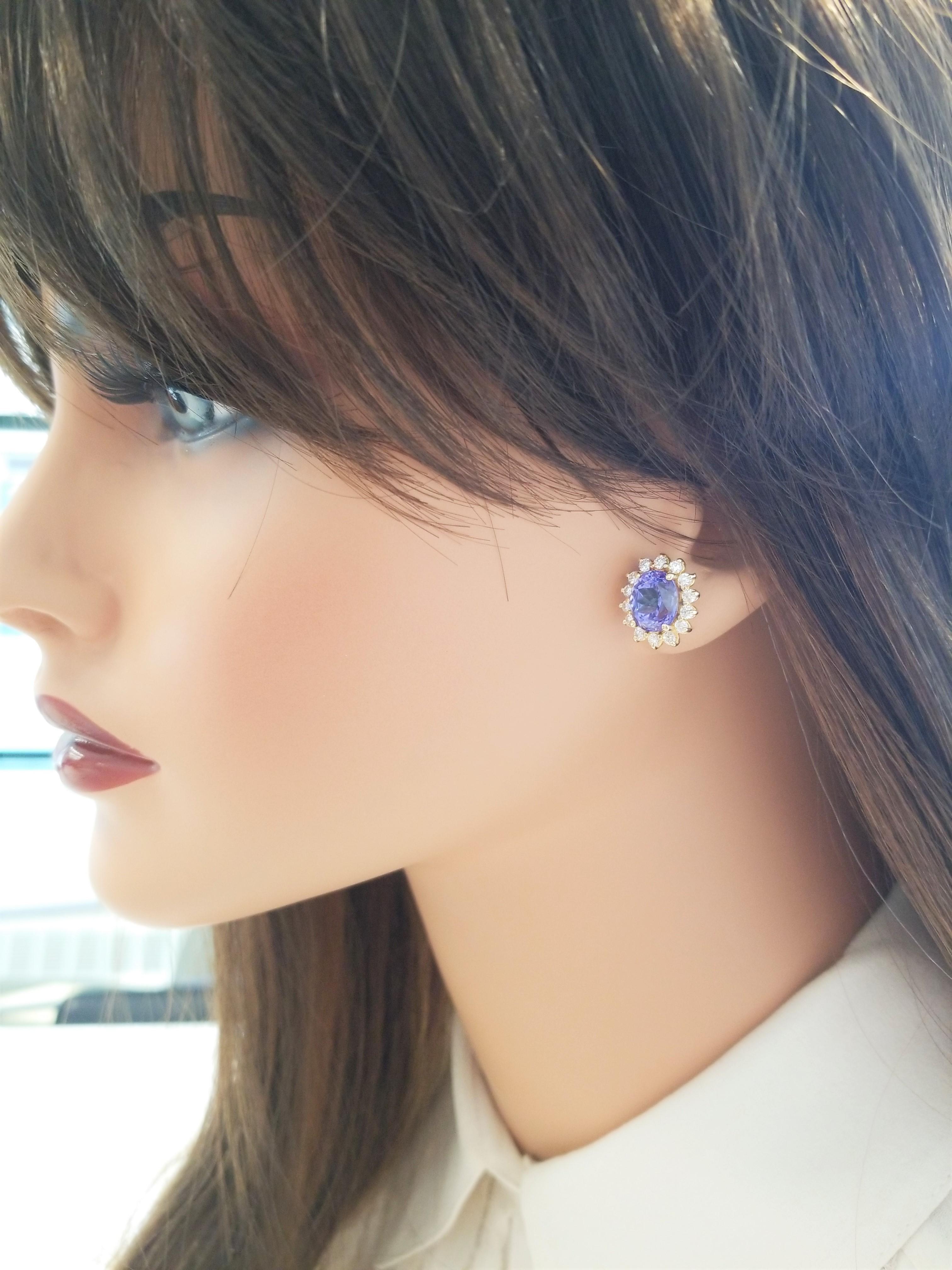 Contemporary 5.43 Carat Total Oval Tanzanite and Diamond White Gold Earrings For Sale