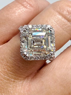5.43 carats Asscher Cut Diamond engagement ring 18KT