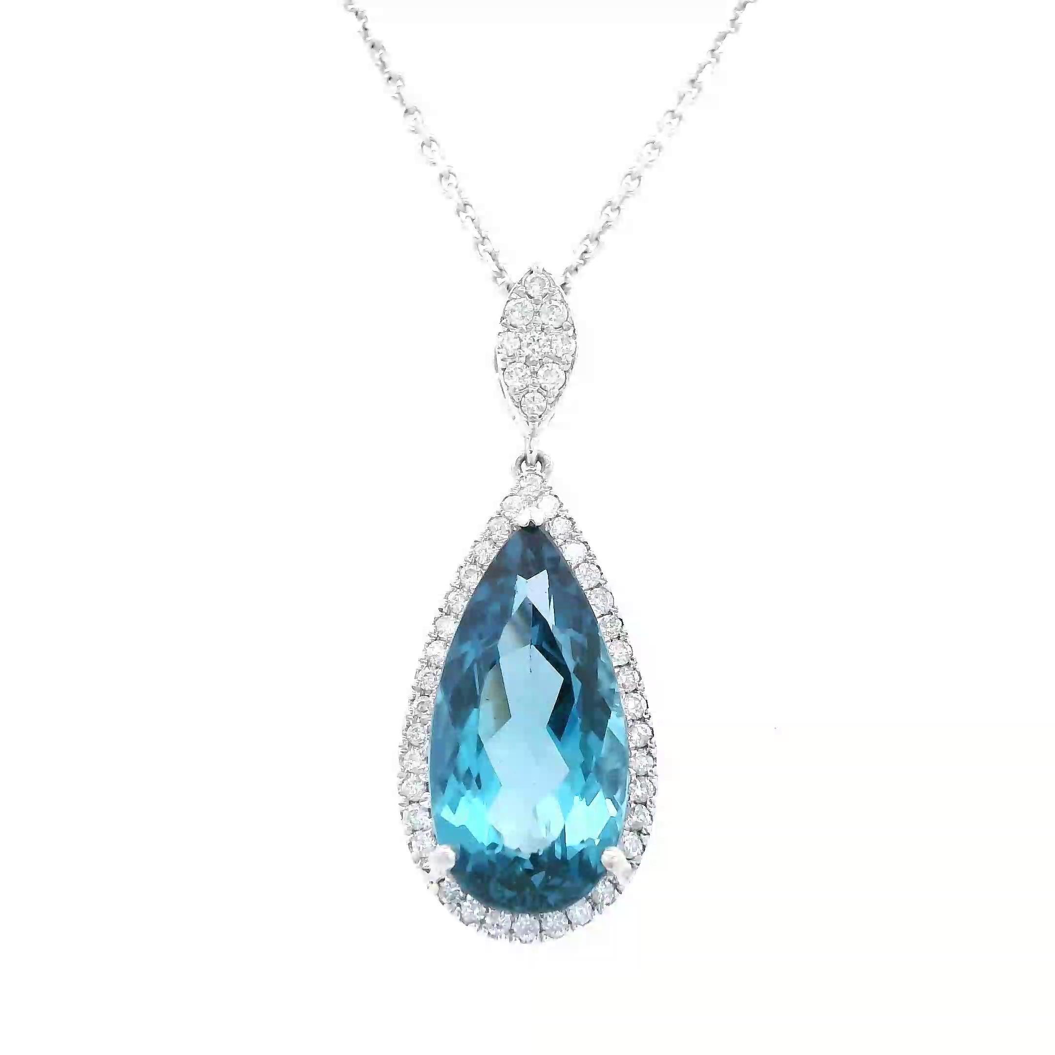 Stunning London blue topaz pendant necklace.
5.66 carats total gemstone weight.
5.43 carat pear London blue topaz. 45 round brilliant diamonds, 0.23 carats. Approximately G color and VS2 clarity. 14-karat white gold, 4.31 grams, 18