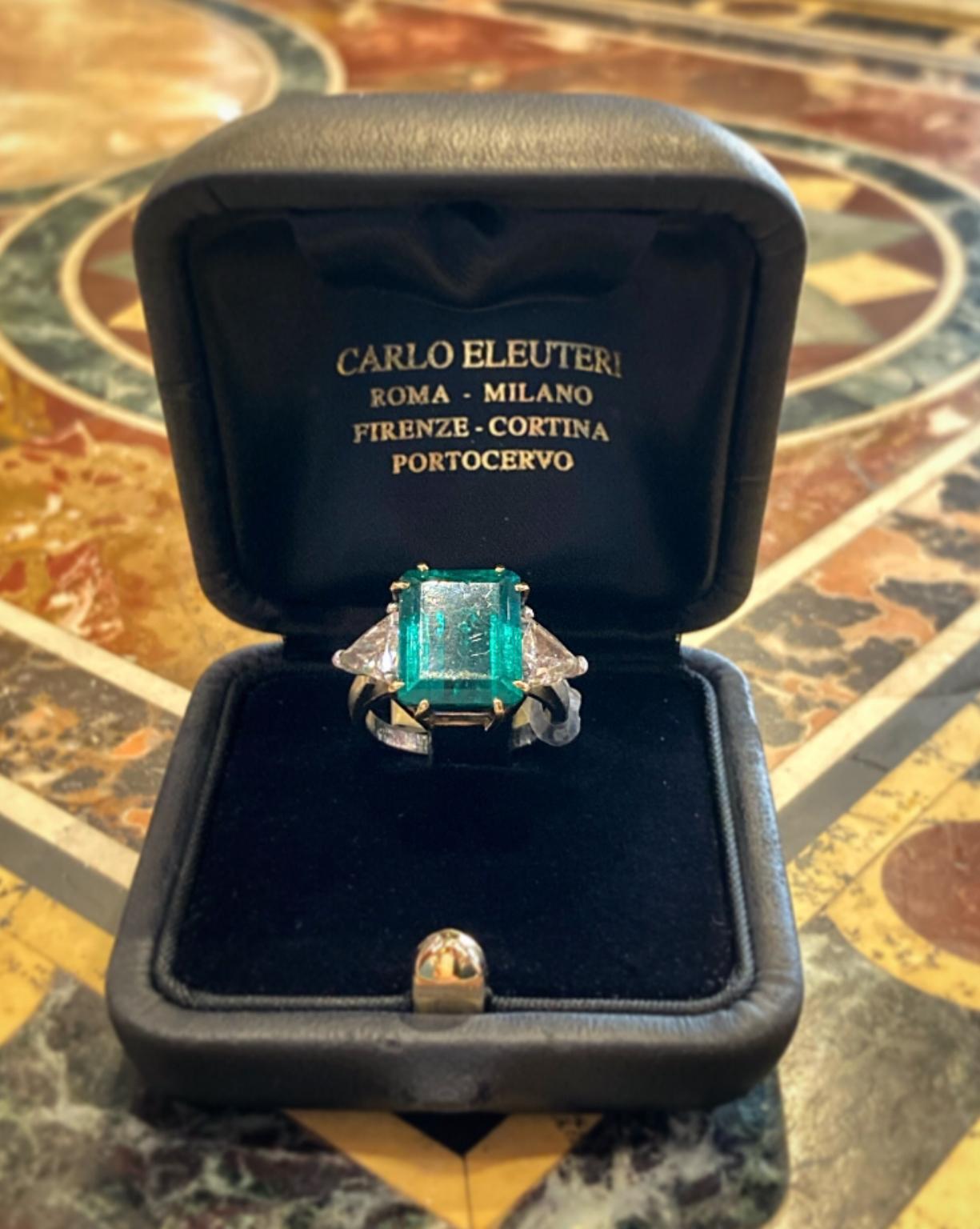 A stunning 5.44 carat rectangular step cut Colombian emerald and diamond white gold ring, made circa 1950. CISGEM certificate available.