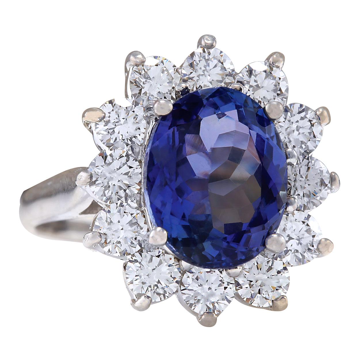 5.44 Carat Tanzanite 14 Karat White Gold Diamond Ring
Stamped: 14K White Gold
Total Ring Weight: 5.8 Grams
Total  Tanzanite Weight is 4.02 Carat (Measures: 11.00x9.00 mm)
Color: Blue
Total  Diamond Weight is 1.42 Carat
Color: F-G, Clarity: