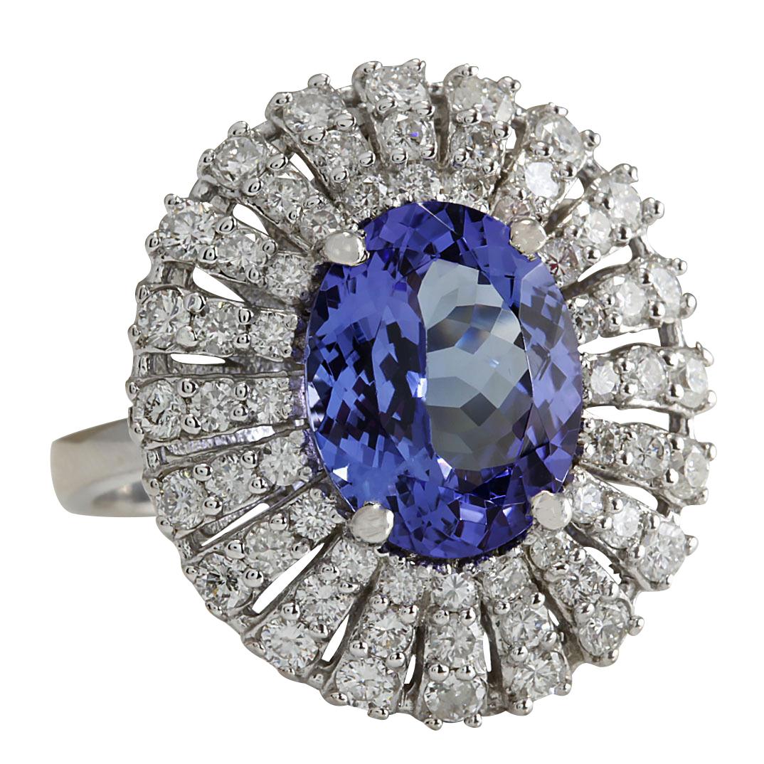 Indulge in the timeless elegance of our 5.45 Carat Natural Tanzanite 14 Karat White Gold Diamond Ring. Crafted with meticulous attention to detail, this stunning piece features a lustrous 14K White Gold band.
At the heart of this mesmerizing ring is
