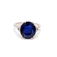 5.45 Carat Sapphire 0.70 Carat Half Moon Shape Diamond 18K White Gold Ring