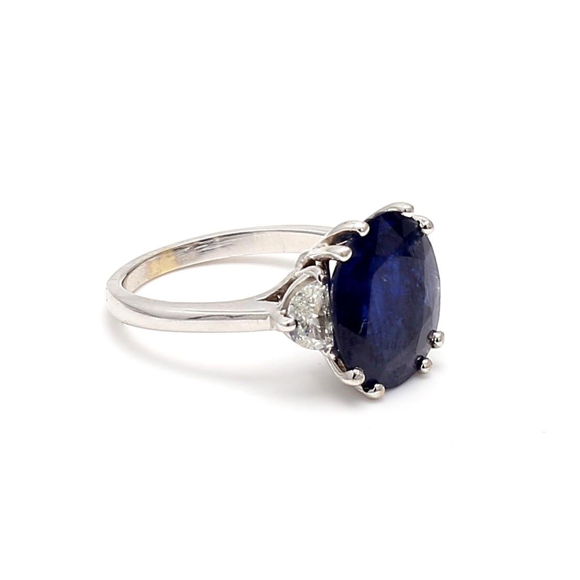Oval Cut 5.45 Carat Sapphire 0.70 Carat Half Moon Shape Diamond 18K White Gold Ring For Sale