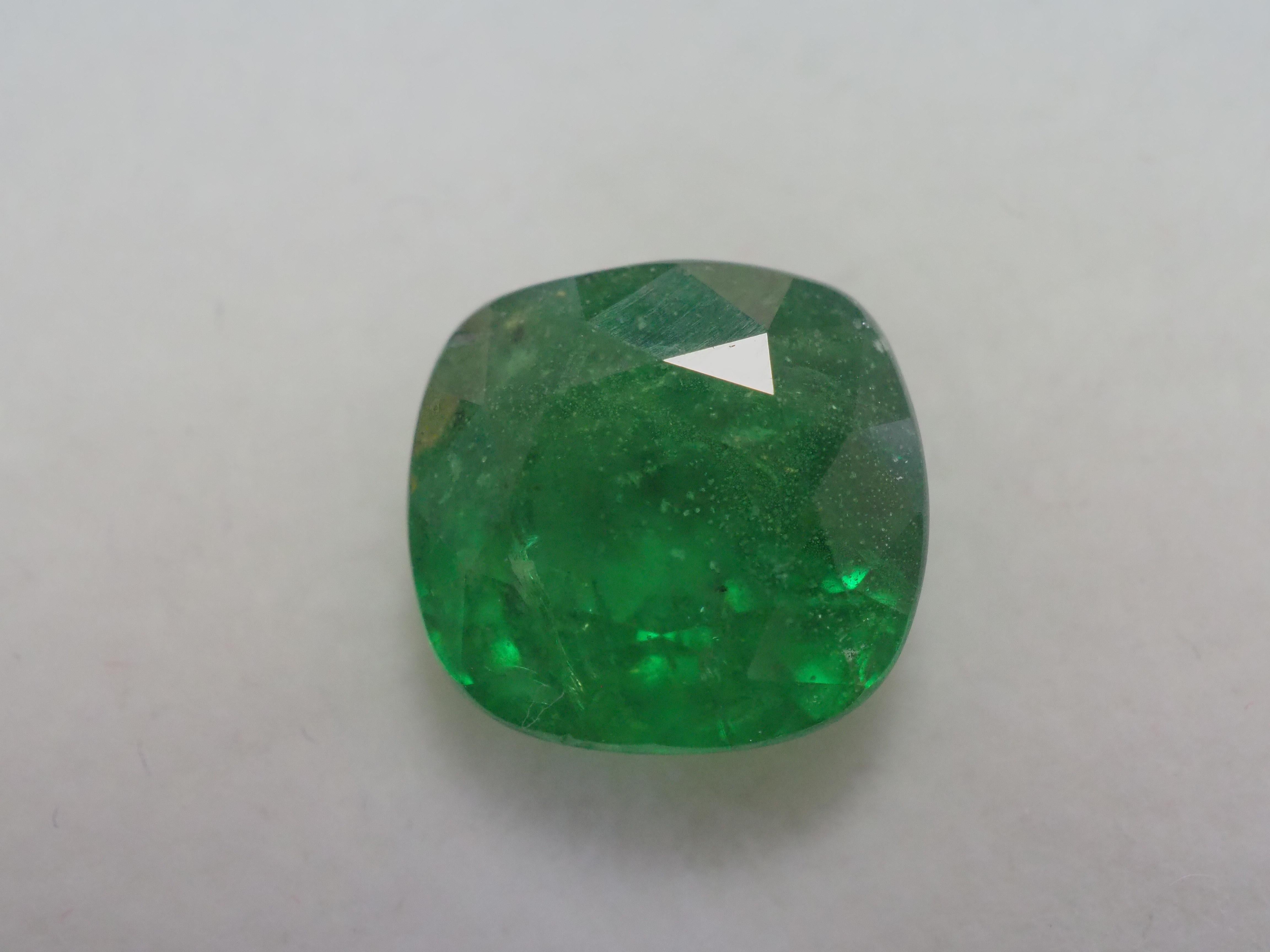 5.45 carats of cushion cut bright and sparkling green Tsavorite garnet gemstone, a gemstone with good cut and nice color with perfect size for a classy cocktail ring for all genders. It has some moderate inclusions and nicks which can see by naked