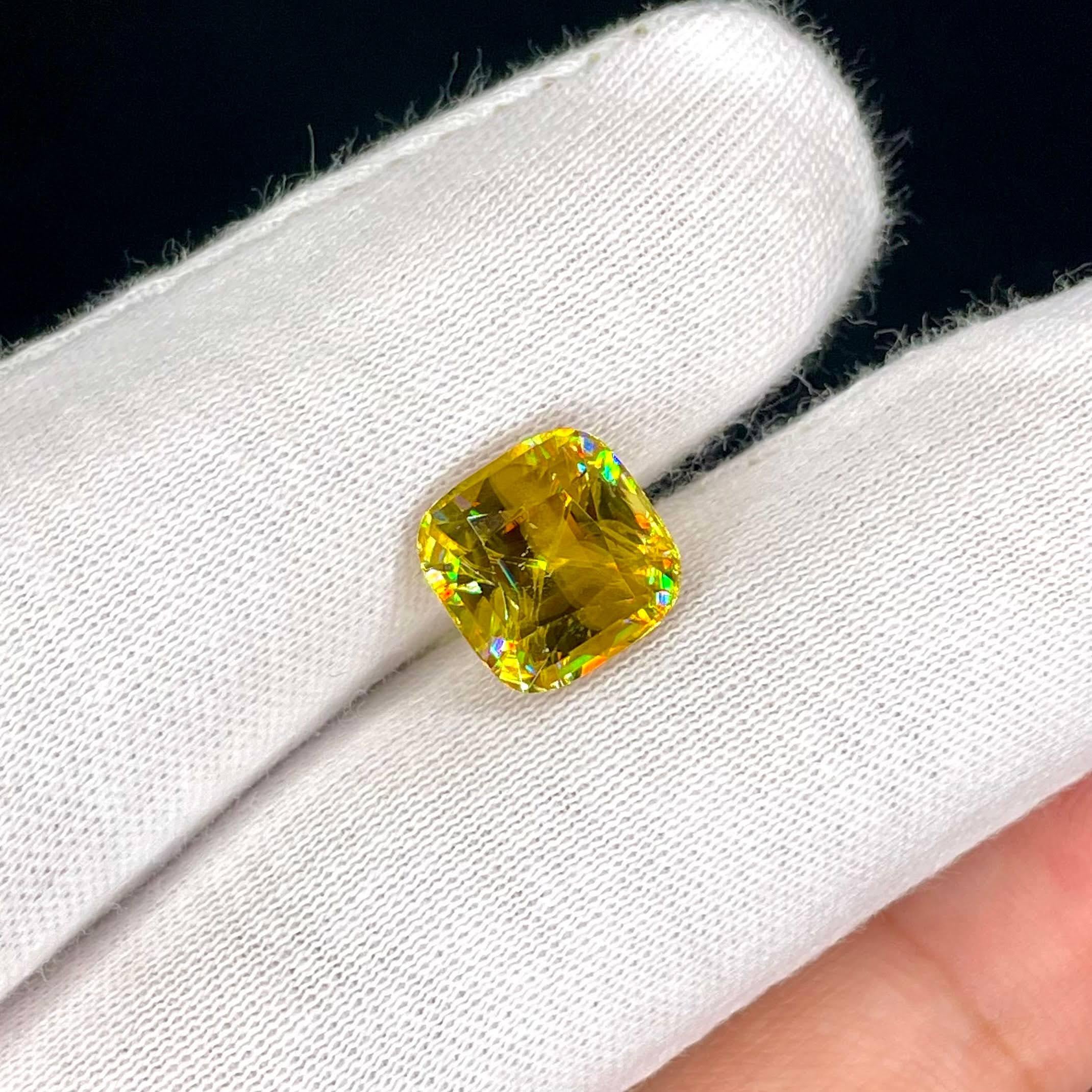 Weight 5.45 carats 
Dimensions 10.1x10.1x6.78 mm 
Treatment none 
Origin Madagascar 
Clarity VVS 
Shape cushion
Cut fancy cushion 



The 5.45 carats Fine Sphene Stone, with its mesmerizing Fancy Cushion Cut, stands as a radiant testament to