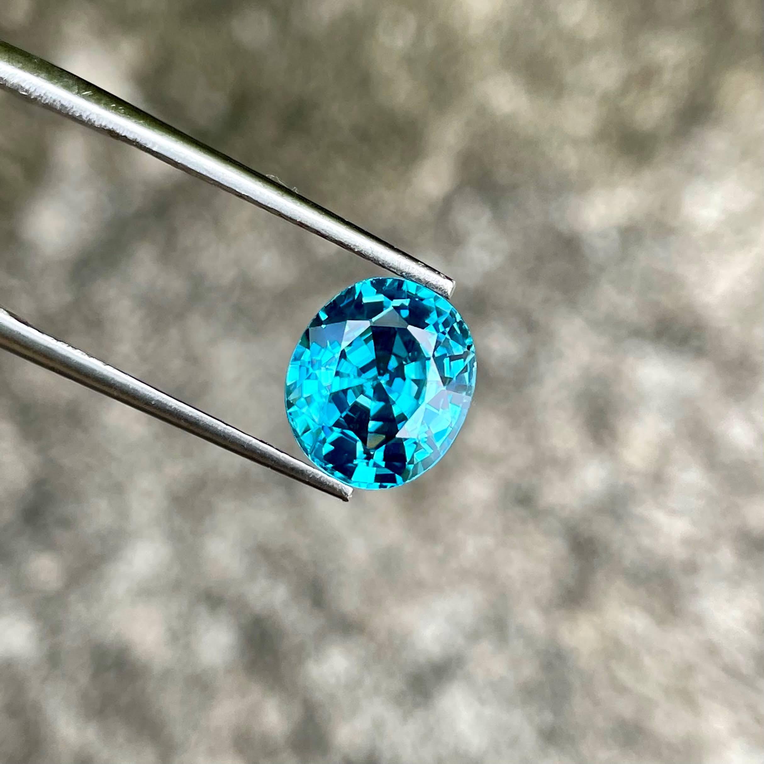 Women's or Men's 5.45 carats Loose Blue Zircon Stone Oval Cut Natural Cambodian Gemstone For Sale
