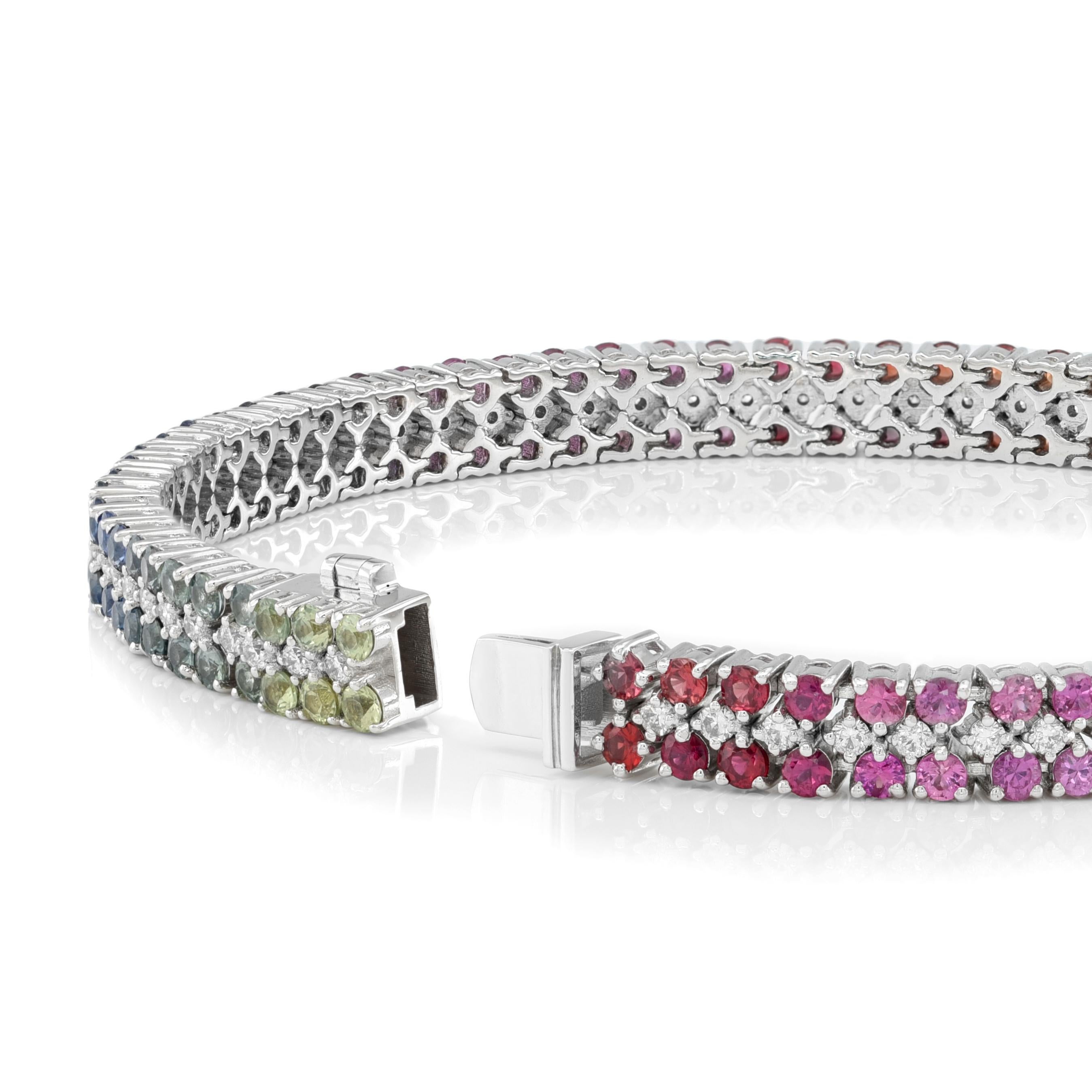 Indulge in the luxurious allure of our exquisite 5.45 carats Natural Rainbow Multi Color Sapphires and 0.86 carats Diamonds, elegantly set within an 18K White Gold Bracelet. Each gem, meticulously cut in Sri Lanka's Brilliant style, radiates a