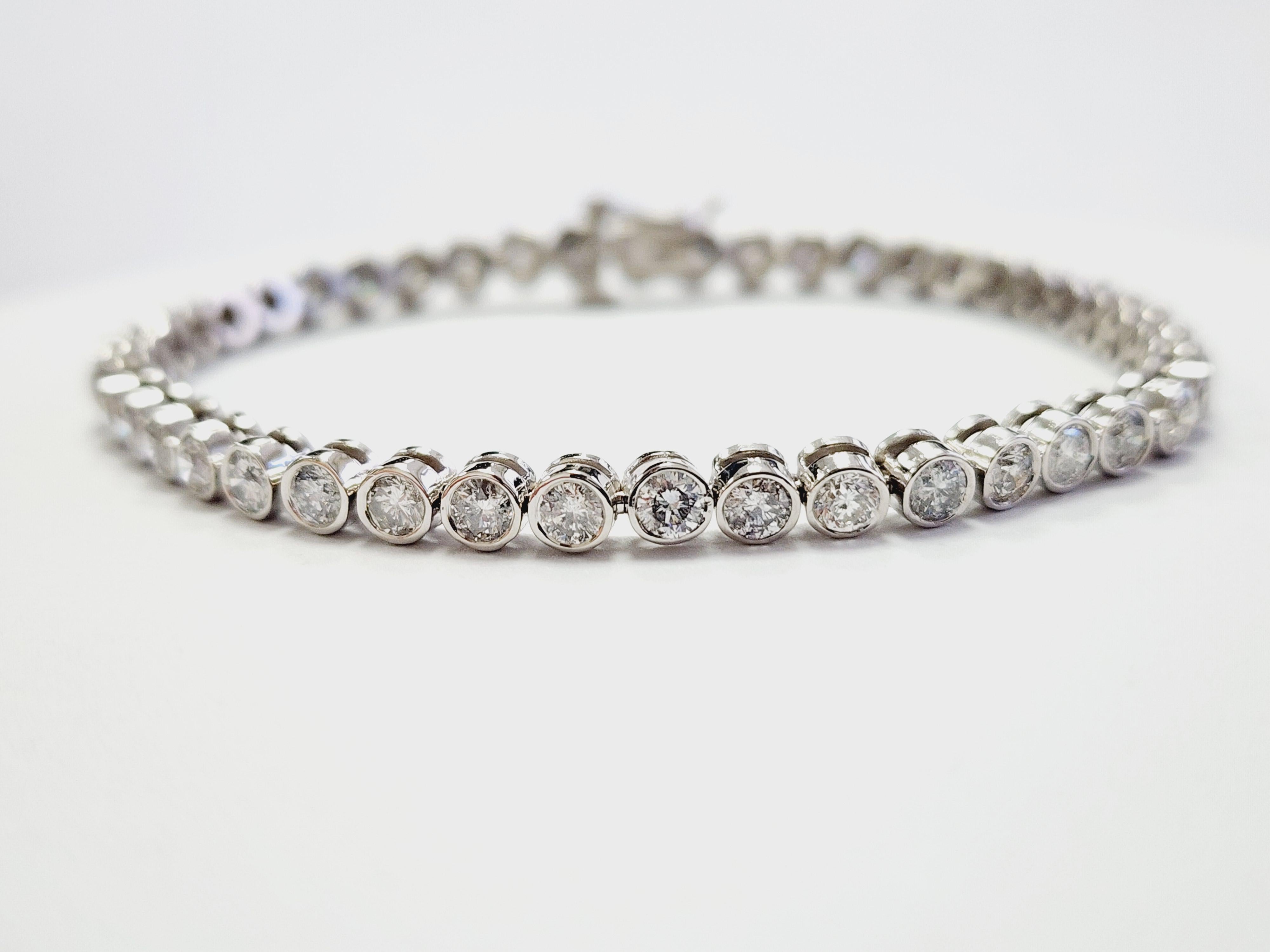 Round Cut 5.45 Carats Natural Diamond Round Bezel Tube Tennis Bracelet in 14K White Gold For Sale