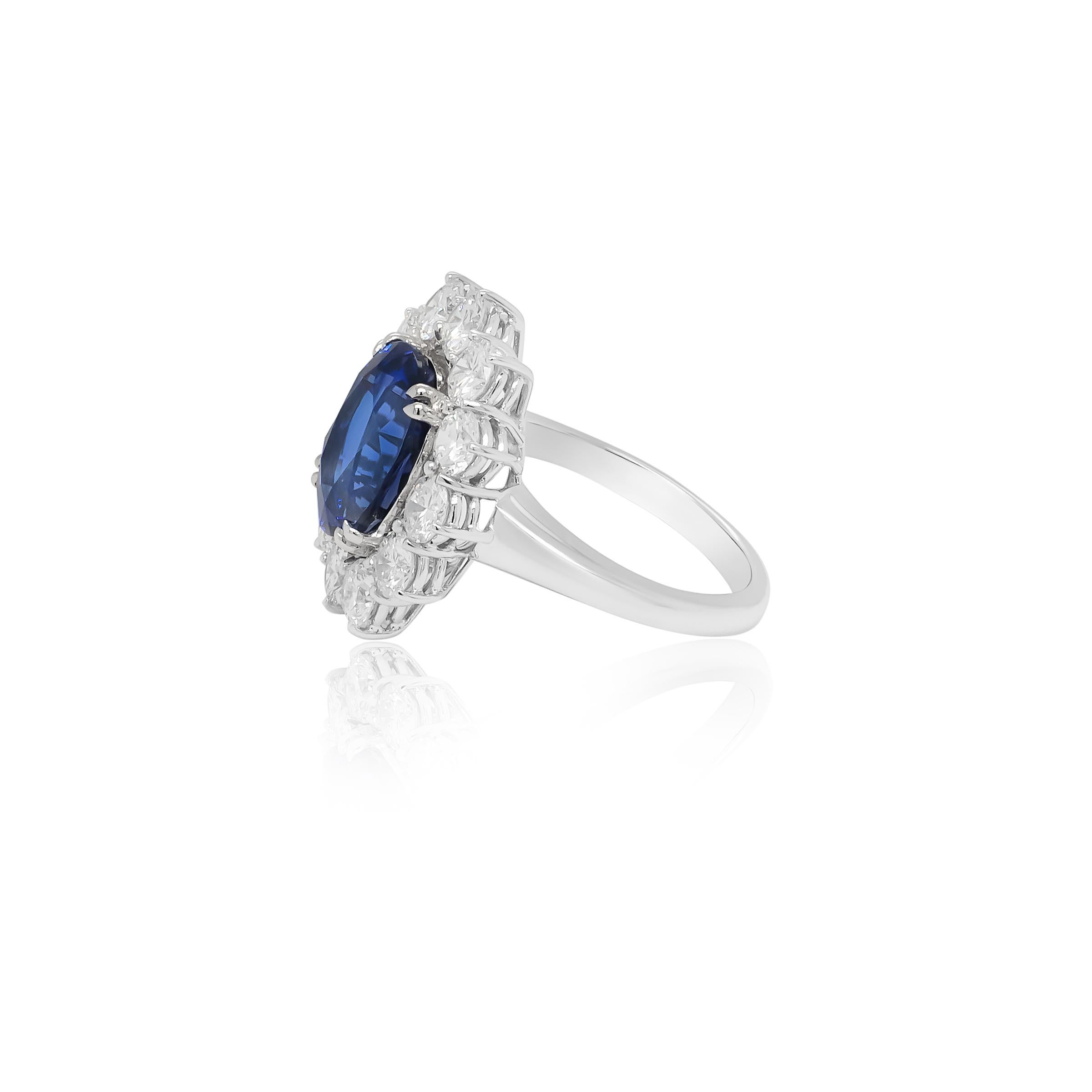A masterpiece of elegance and sophistication, this stunning ring features a mesmerizing 5.46-carat AAA tanzanite as its centerpiece. The exceptional gemstone exhibits a vivid, deep blue hue with remarkable luster, so striking it can easily be