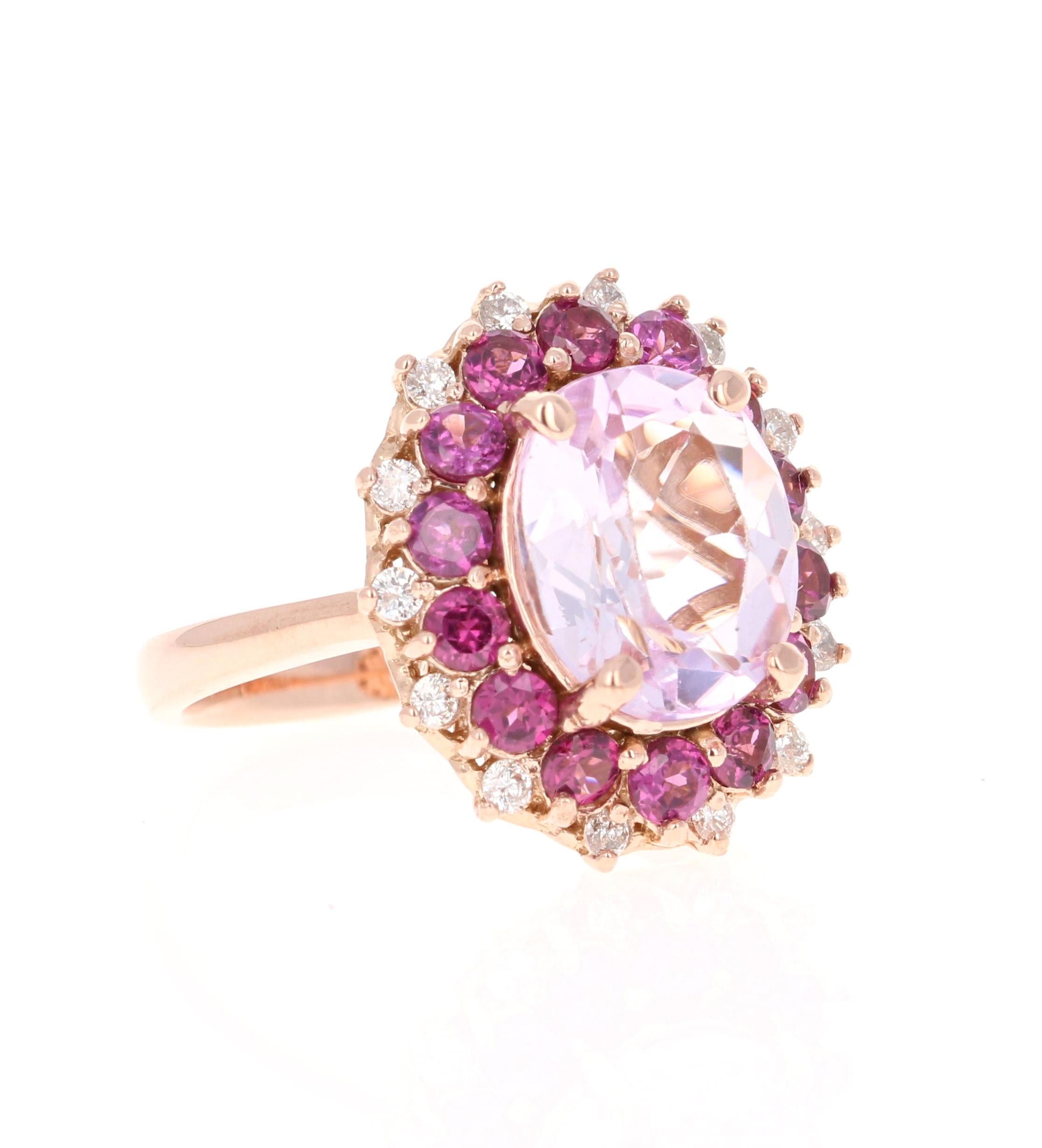5.46 Carat Kunzite Diamond Garnet Rose Gold Cocktail Ring

This beautiful ring has an Oval Cut Kunzite weighing 3.84 carats and is surrounded by 14 Round Cut Garnets that weigh 1.36 Carats and 14 Round Cut Diamonds that weigh 0.26 carats (Clarity:
